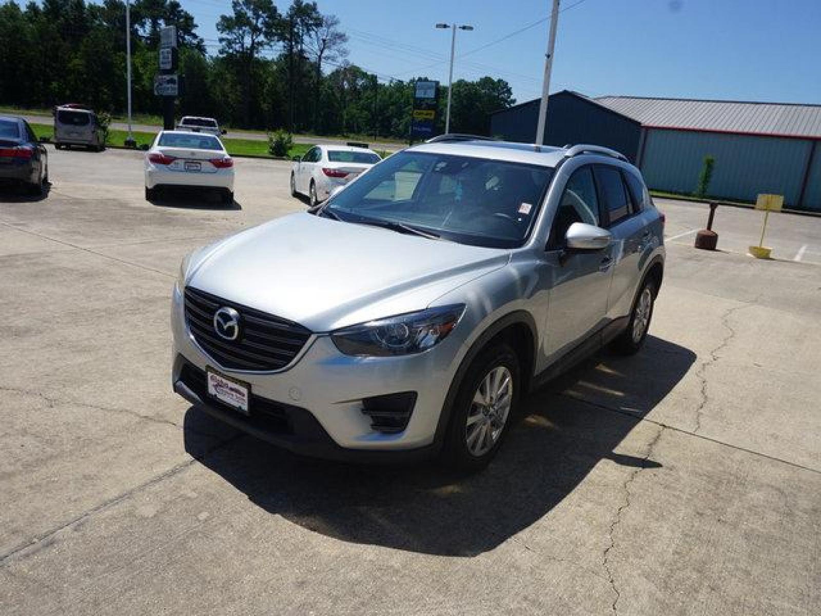 2016 Silver Mazda CX-5 (JM3KE2CY8G0) with an 2.5L 4Cyl engine, Automatic transmission, located at 6904 Johnston St., Lafayette, LA, 70503, (337) 988-1960, 30.143589, -92.100601 - Prices are subject to change as improvements done by the service dept. Prices are for Cash sales only, Plus TTL. This Vehicle is Serviced well and Warranties Available too. Easy Financing. Drives Great and everything works. Price subject to change as improvements done by the service dept. Easy CR - Photo #5