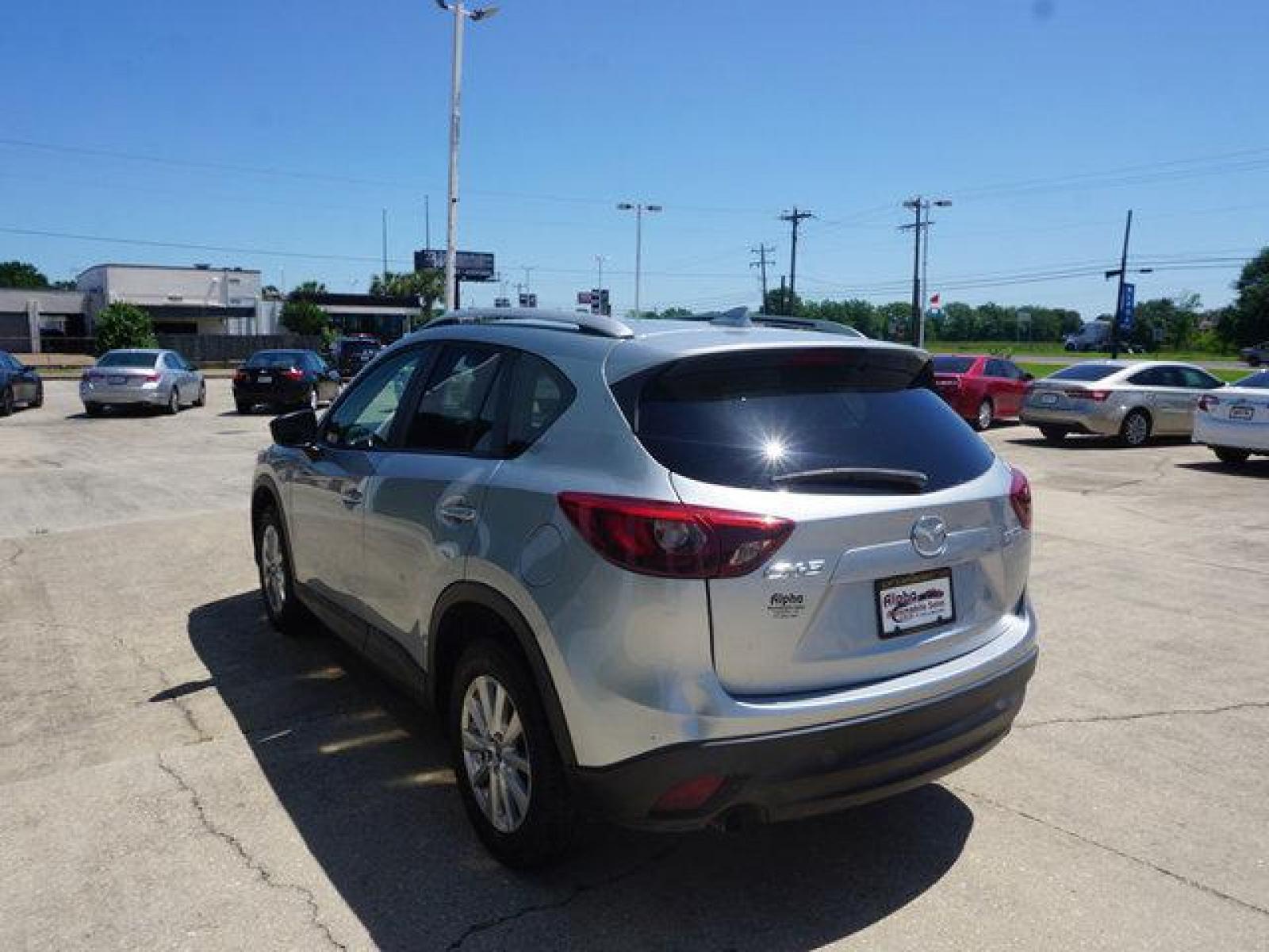 2016 Silver Mazda CX-5 (JM3KE2CY8G0) with an 2.5L 4Cyl engine, Automatic transmission, located at 6904 Johnston St., Lafayette, LA, 70503, (337) 988-1960, 30.143589, -92.100601 - Prices are subject to change as improvements done by the service dept. Prices are for Cash sales only, Plus TTL. This Vehicle is Serviced well and Warranties Available too. Easy Financing. Drives Great and everything works. Price subject to change as improvements done by the service dept. Easy CR - Photo #8