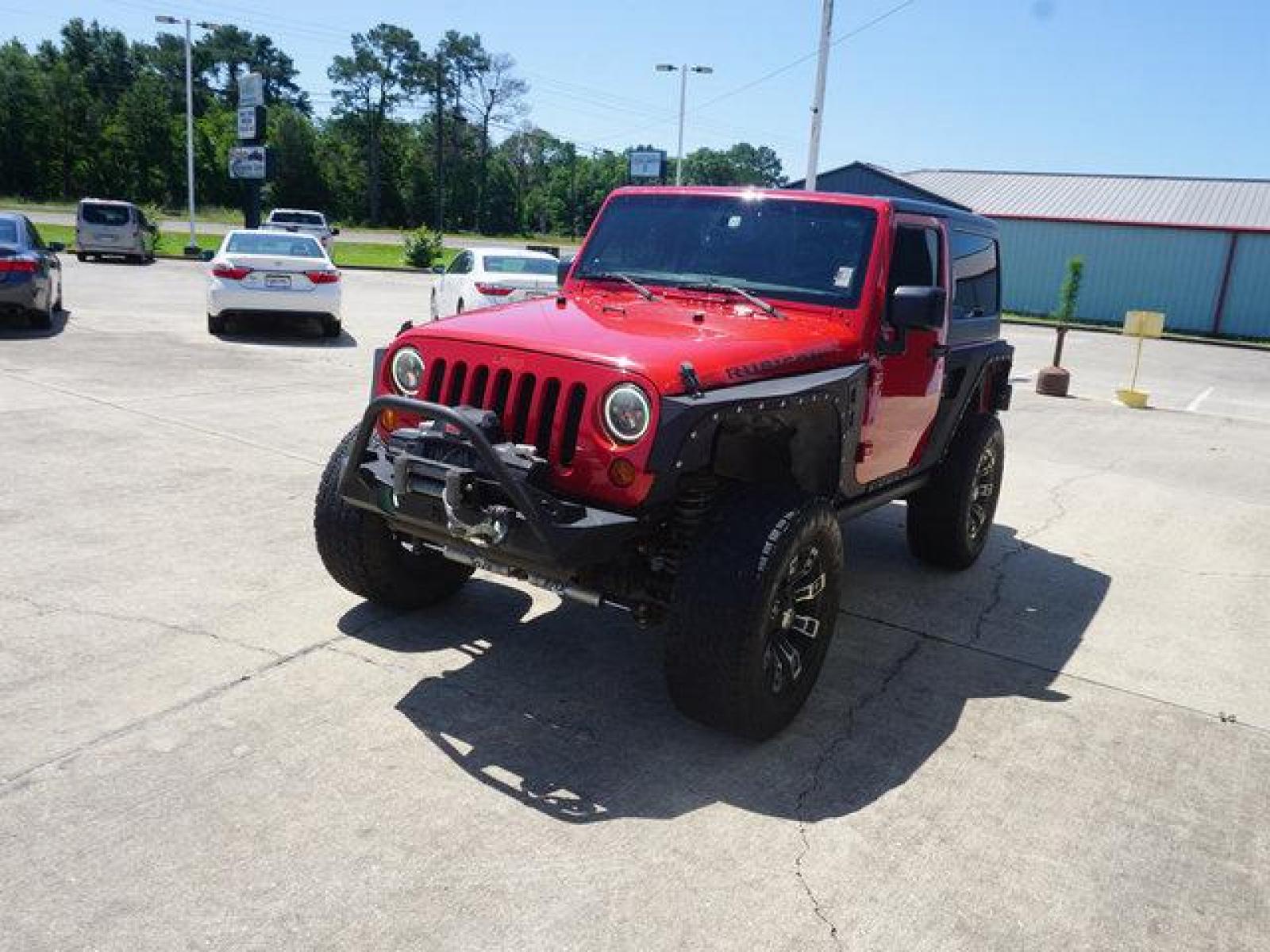 2012 Red Jeep Wrangler (1C4BJWCG9CL) with an 3.6L V6 engine, 6 Spd Automatic transmission, located at 6904 Johnston St., Lafayette, LA, 70503, (337) 988-1960, 30.143589, -92.100601 - beautiful Jeep Prices are subject to change as improvements done by the service dept. Prices are for Cash sales only, Plus TTL. This Vehicle is Serviced well and Warranties Available too. Easy Financing. Drives Great and everything works. Price subject to change as improvements done by the servi - Photo #4