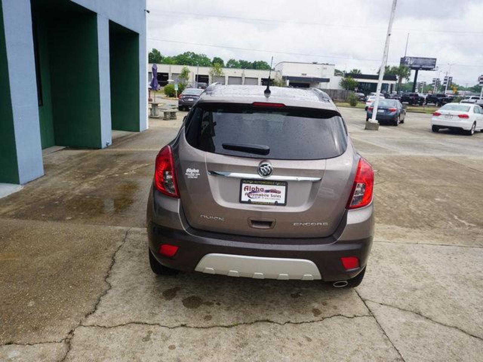 2014 Brown Buick Encore (KL4CJDSB3EB) with an 1.4L I4 Turbo engine, Automatic transmission, located at 6904 Johnston St., Lafayette, LA, 70503, (337) 988-1960, 30.143589, -92.100601 - Prices are subject to change as improvements done by the service dept. Prices are for Cash sales only, Plus TTL. This Vehicle is Serviced well and Warranties Available too. Easy Financing. Drives Great and everything works. Price subject to change as improvements done by the service dept. Easy CR - Photo #9