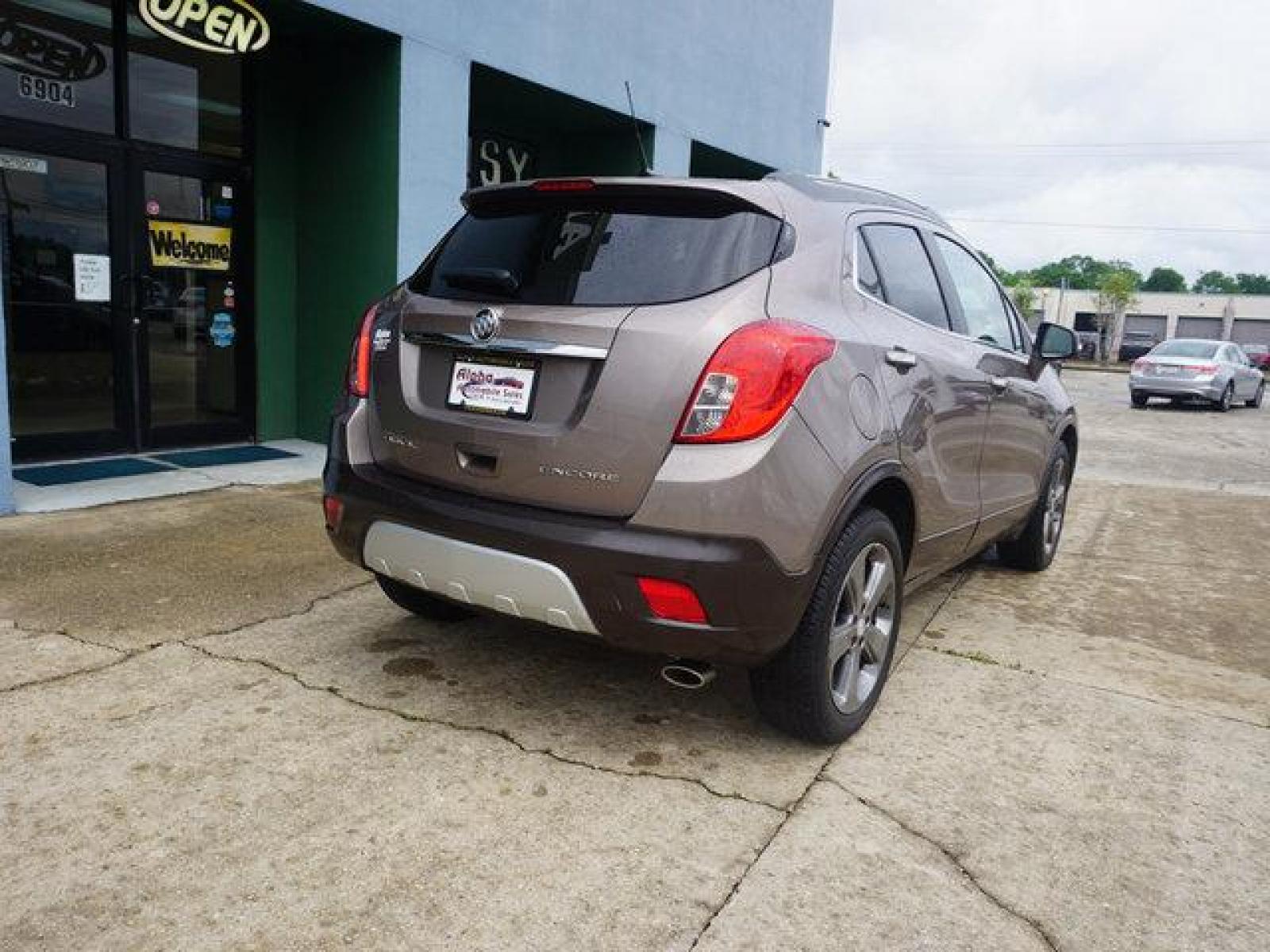 2014 Brown Buick Encore (KL4CJDSB3EB) with an 1.4L I4 Turbo engine, Automatic transmission, located at 6904 Johnston St., Lafayette, LA, 70503, (337) 988-1960, 30.143589, -92.100601 - Prices are subject to change as improvements done by the service dept. Prices are for Cash sales only, Plus TTL. This Vehicle is Serviced well and Warranties Available too. Easy Financing. Drives Great and everything works. Price subject to change as improvements done by the service dept. Easy CR - Photo #12