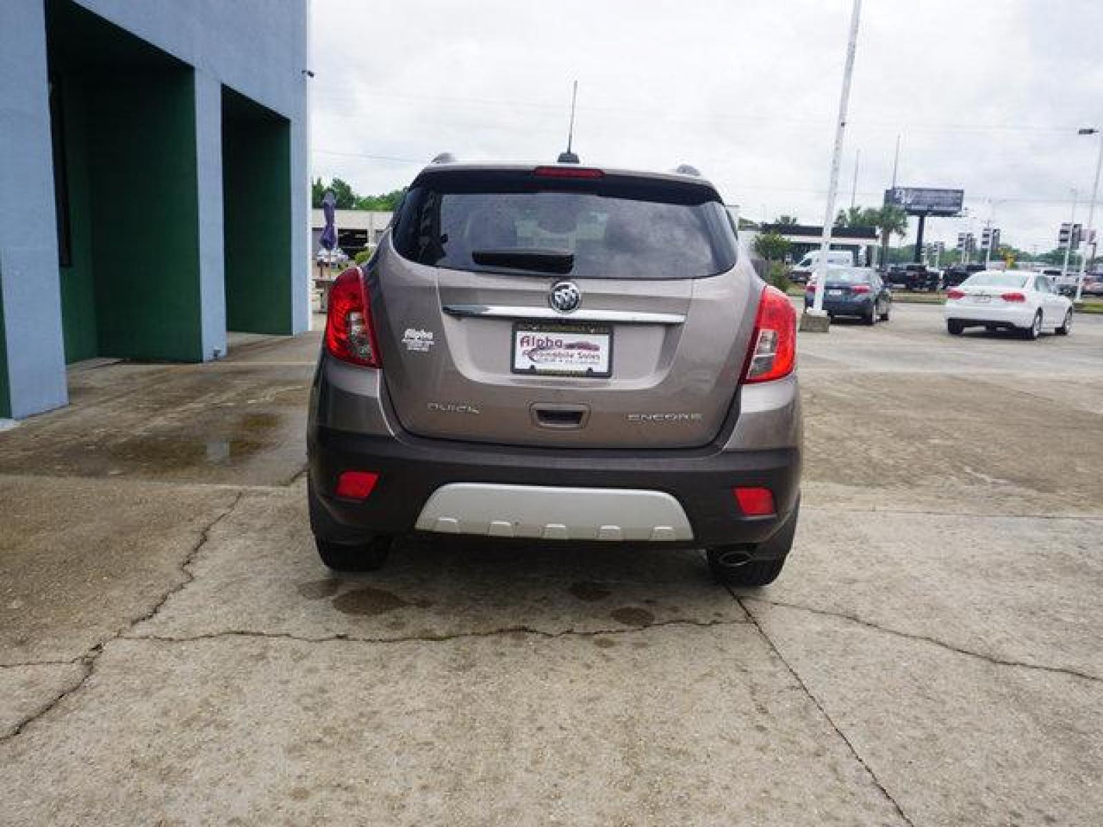 2015 Brown Buick Encore (KL4CJCSB4FB) with an 1.4L I4 Turbo engine, Automatic transmission, located at 6904 Johnston St., Lafayette, LA, 70503, (337) 988-1960, 30.143589, -92.100601 - Prices are subject to change as improvements done by the service dept. Prices are for Cash sales only, Plus TTL. This Vehicle is Serviced well and Warranties Available too. Easy Financing. Drives Great and everything works. Price subject to change as improvements done by the service dept. Easy CR - Photo #10