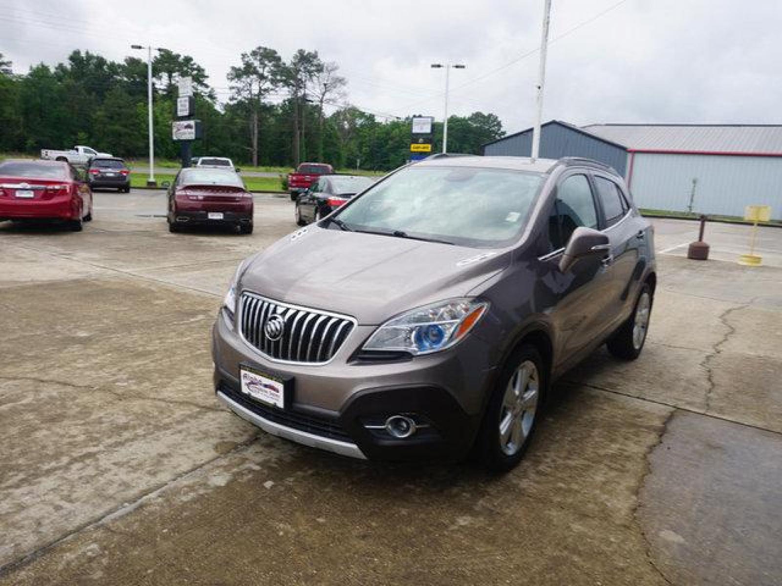 2015 Brown Buick Encore (KL4CJCSB4FB) with an 1.4L I4 Turbo engine, Automatic transmission, located at 6904 Johnston St., Lafayette, LA, 70503, (337) 988-1960, 30.143589, -92.100601 - Prices are subject to change as improvements done by the service dept. Prices are for Cash sales only, Plus TTL. This Vehicle is Serviced well and Warranties Available too. Easy Financing. Drives Great and everything works. Price subject to change as improvements done by the service dept. Easy CR - Photo #4