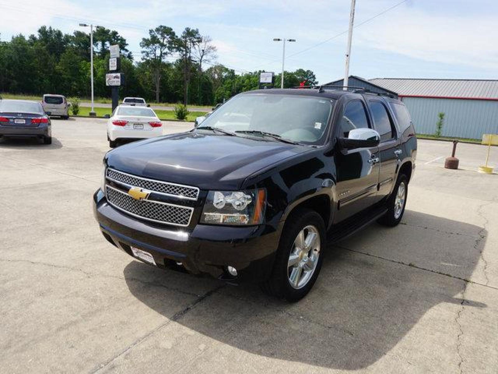 2014 Black Chevrolet Tahoe (1GNSCBE04ER) with an 5.3L V8 engine, Automatic transmission, located at 6904 Johnston St., Lafayette, LA, 70503, (337) 988-1960, 30.143589, -92.100601 - Prices are subject to change as improvements done by the service dept. Prices are for Cash sales only, Plus TTL. This Vehicle is Serviced well and Warranties Available too. Easy Financing. Drives Great and everything works. Price subject to change as improvements done by the service dept. Easy CR - Photo #4