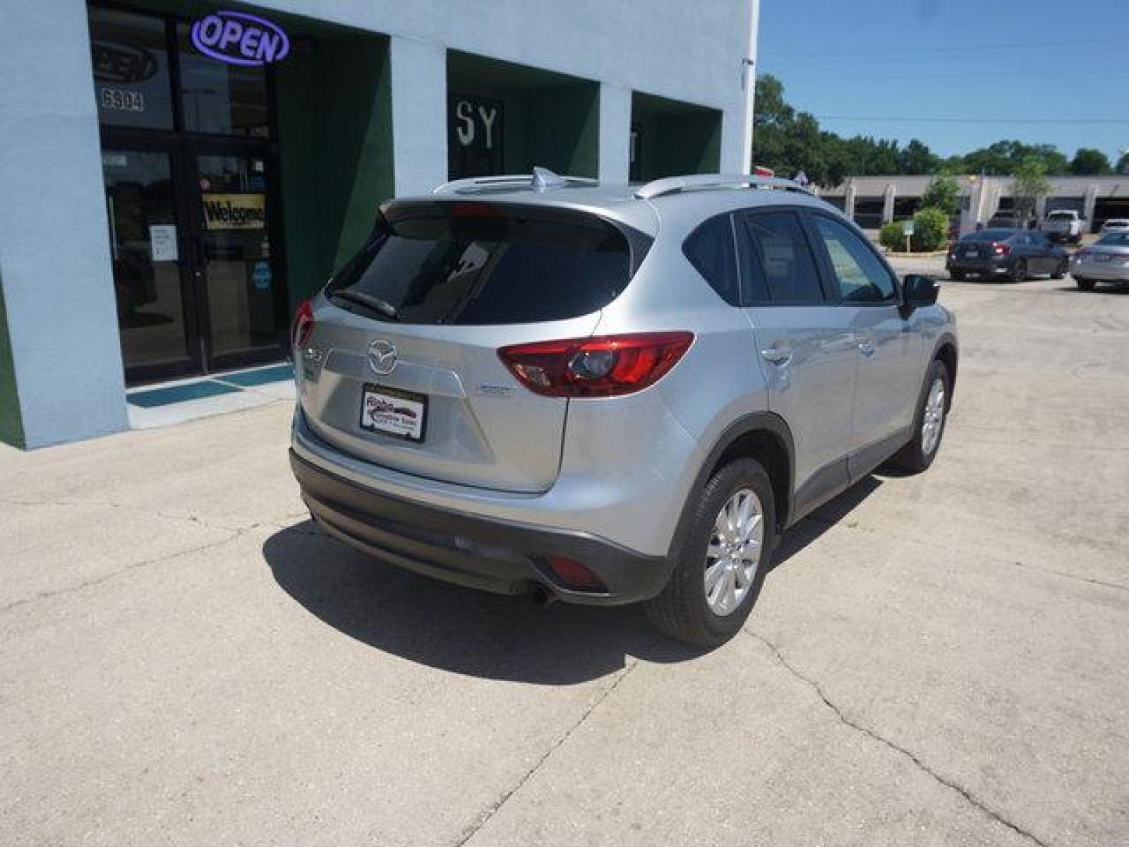 2016 Silver Mazda CX-5 (JM3KE2CY8G0) with an 2.5L 4Cyl engine, Automatic transmission, located at 6904 Johnston St., Lafayette, LA, 70503, (337) 988-1960, 30.143589, -92.100601 - Prices are subject to change as improvements done by the service dept. Prices are for Cash sales only, Plus TTL. This Vehicle is Serviced well and Warranties Available too. Easy Financing. Drives Great and everything works. Price subject to change as improvements done by the service dept. Easy CR - Photo #12