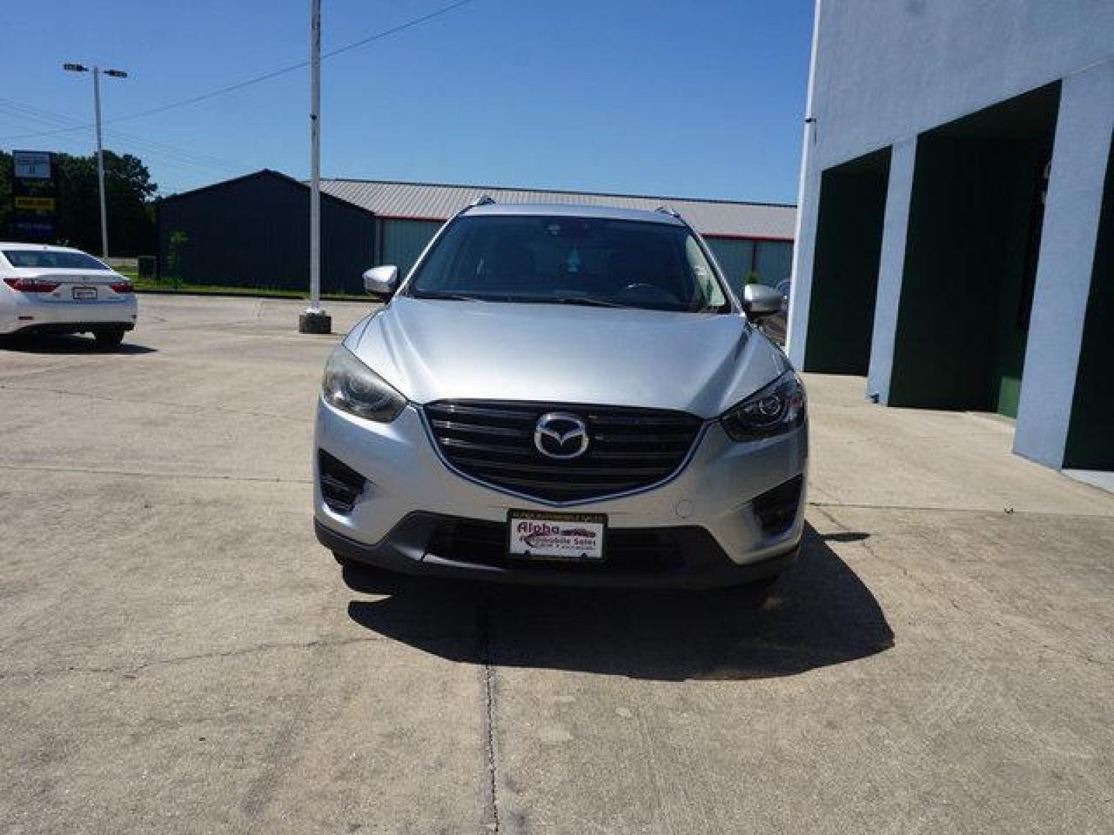 2016 Silver Mazda CX-5 (JM3KE2CY8G0) with an 2.5L 4Cyl engine, Automatic transmission, located at 6904 Johnston St., Lafayette, LA, 70503, (337) 988-1960, 30.143589, -92.100601 - Prices are subject to change as improvements done by the service dept. Prices are for Cash sales only, Plus TTL. This Vehicle is Serviced well and Warranties Available too. Easy Financing. Drives Great and everything works. Price subject to change as improvements done by the service dept. Easy CR - Photo #4
