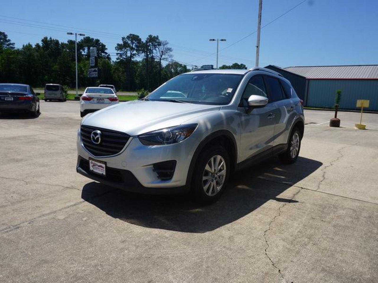 2016 Silver Mazda CX-5 (JM3KE2CY8G0) with an 2.5L 4Cyl engine, Automatic transmission, located at 6904 Johnston St., Lafayette, LA, 70503, (337) 988-1960, 30.143589, -92.100601 - Prices are subject to change as improvements done by the service dept. Prices are for Cash sales only, Plus TTL. This Vehicle is Serviced well and Warranties Available too. Easy Financing. Drives Great and everything works. Price subject to change as improvements done by the service dept. Easy CR - Photo #6