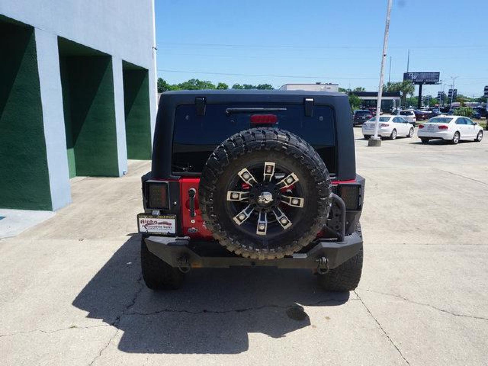 2012 Red Jeep Wrangler (1C4BJWCG9CL) with an 3.6L V6 engine, 6 Spd Automatic transmission, located at 6904 Johnston St., Lafayette, LA, 70503, (337) 988-1960, 30.143589, -92.100601 - beautiful Jeep Prices are subject to change as improvements done by the service dept. Prices are for Cash sales only, Plus TTL. This Vehicle is Serviced well and Warranties Available too. Easy Financing. Drives Great and everything works. Price subject to change as improvements done by the servi - Photo #9