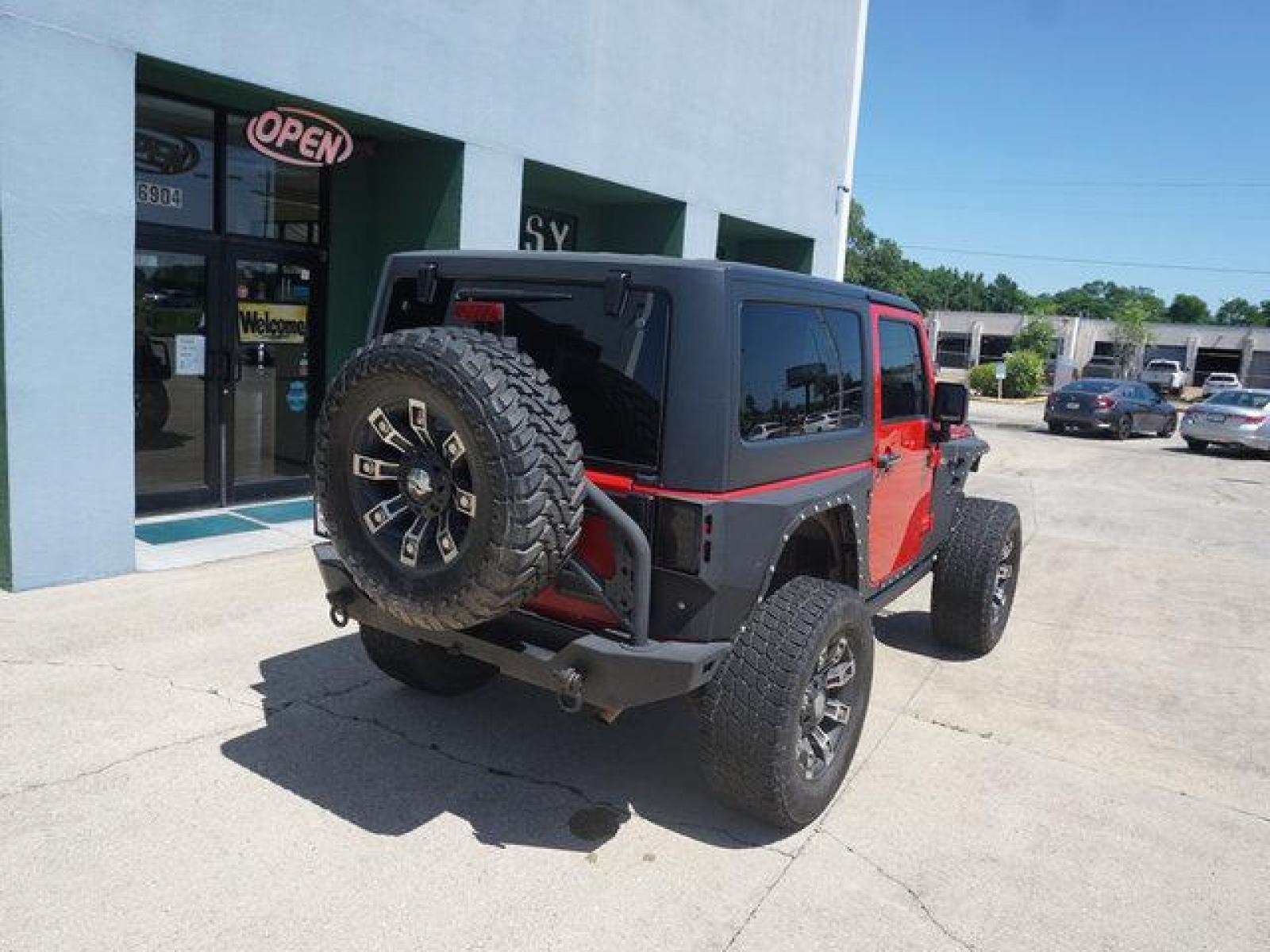 2012 Red Jeep Wrangler (1C4BJWCG9CL) with an 3.6L V6 engine, 6 Spd Automatic transmission, located at 6904 Johnston St., Lafayette, LA, 70503, (337) 988-1960, 30.143589, -92.100601 - beautiful Jeep Prices are subject to change as improvements done by the service dept. Prices are for Cash sales only, Plus TTL. This Vehicle is Serviced well and Warranties Available too. Easy Financing. Drives Great and everything works. Price subject to change as improvements done by the servi - Photo #11