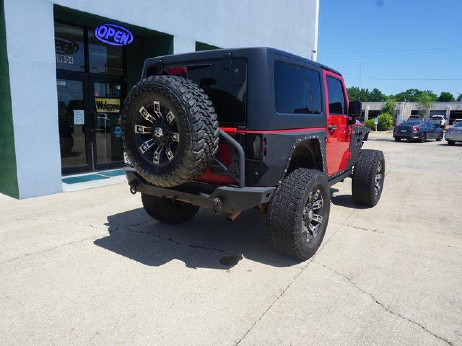 2012 Red Jeep Wrangler (1C4BJWCG9CL) with an 3.6L V6 engine, 6 Spd Automatic transmission, located at 6904 Johnston St., Lafayette, LA, 70503, (337) 988-1960, 30.143589, -92.100601 - beautiful Jeep Prices are subject to change as improvements done by the service dept. Prices are for Cash sales only, Plus TTL. This Vehicle is Serviced well and Warranties Available too. Easy Financing. Drives Great and everything works. Price subject to change as improvements done by the servi - Photo #12
