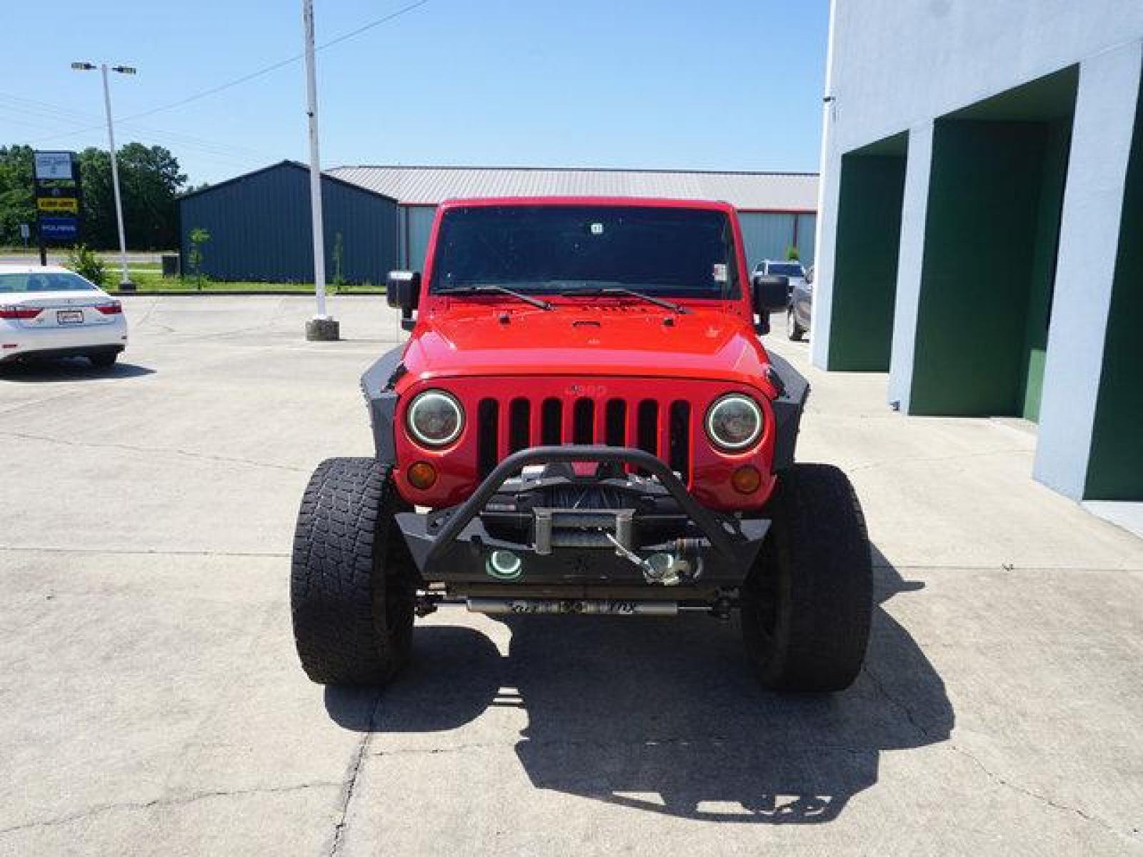 2012 Red Jeep Wrangler (1C4BJWCG9CL) with an 3.6L V6 engine, 6 Spd Automatic transmission, located at 6904 Johnston St., Lafayette, LA, 70503, (337) 988-1960, 30.143589, -92.100601 - beautiful Jeep Prices are subject to change as improvements done by the service dept. Prices are for Cash sales only, Plus TTL. This Vehicle is Serviced well and Warranties Available too. Easy Financing. Drives Great and everything works. Price subject to change as improvements done by the servi - Photo #2