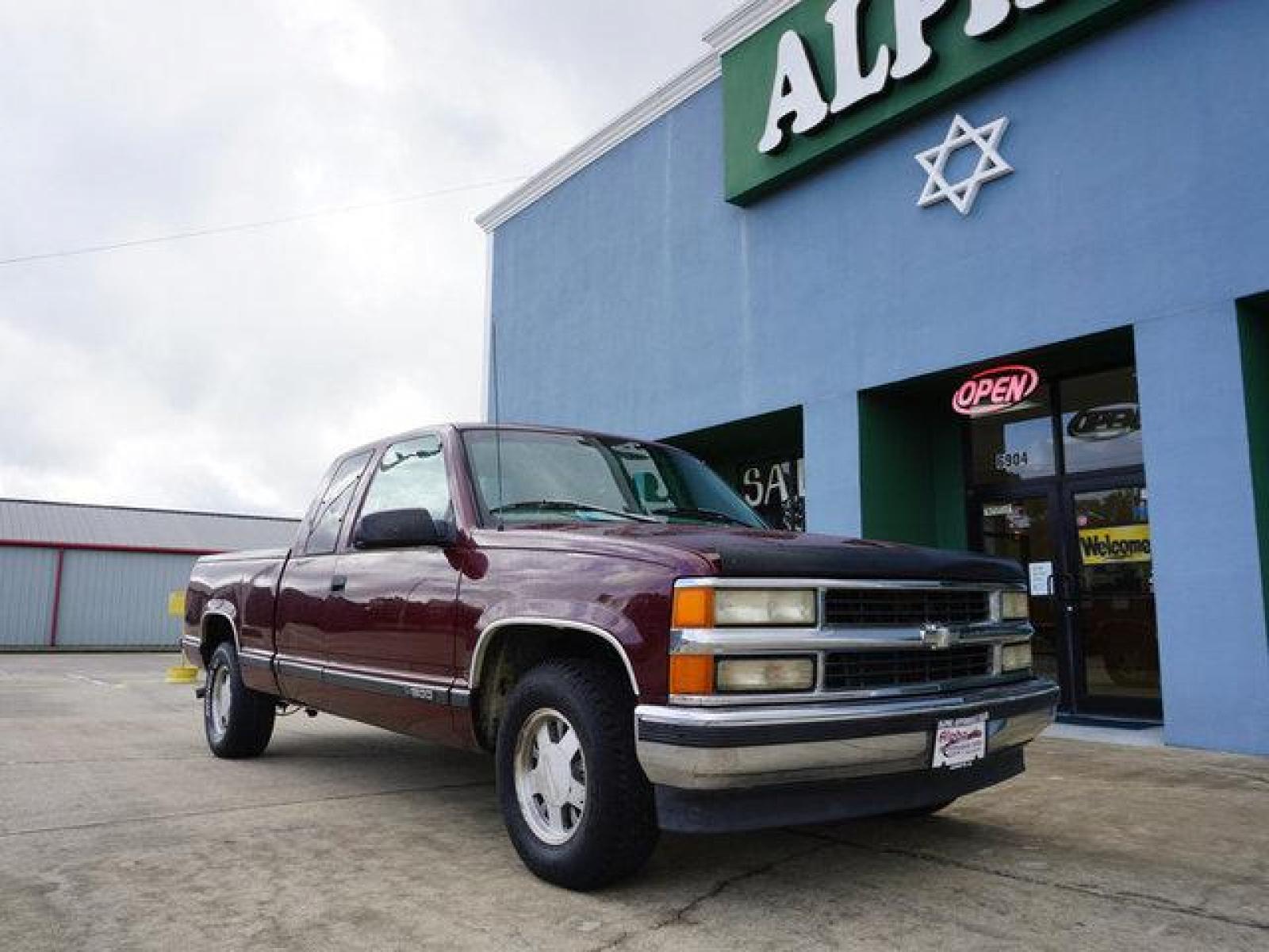 1999 Red Chevrolet C1500 (1GCEC19R4XR) with an 5.7L V8 engine, 4 Spd Automatic transmission, located at 6904 Johnston St., Lafayette, LA, 70503, (337) 988-1960, 30.143589, -92.100601 - N/A. AC works, Runs and pulls good. May need a tune up. Its a money making Truck, use it for lawn, pulling, Painting, hauling, construction work and many other things for a start up business man. Has a small dent on the drivers door. Prices are subject to change as improvements done by the servi - Photo #1