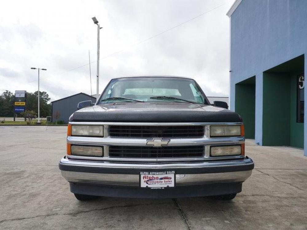 1999 Red Chevrolet C1500 (1GCEC19R4XR) with an 5.7L V8 engine, 4 Spd Automatic transmission, located at 6904 Johnston St., Lafayette, LA, 70503, (337) 988-1960, 30.143589, -92.100601 - N/A. AC works, Runs and pulls good. May need a tune up. Its a money making Truck, use it for lawn, pulling, Painting, hauling, construction work and many other things for a start up business man. Has a small dent on the drivers door. Prices are subject to change as improvements done by the servi - Photo #2