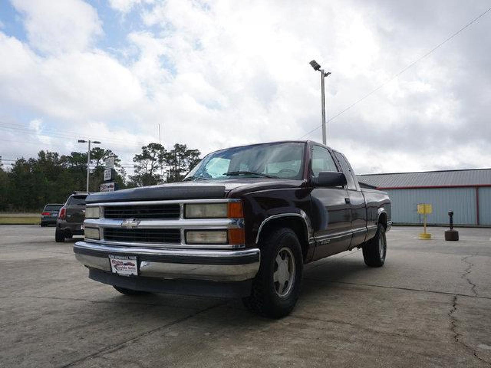 1999 Red Chevrolet C1500 (1GCEC19R4XR) with an 5.7L V8 engine, 4 Spd Automatic transmission, located at 6904 Johnston St., Lafayette, LA, 70503, (337) 988-1960, 30.143589, -92.100601 - N/A. AC works, Runs and pulls good. May need a tune up. Its a money making Truck, use it for lawn, pulling, Painting, hauling, construction work and many other things for a start up business man. Has a small dent on the drivers door. Prices are subject to change as improvements done by the servi - Photo #3