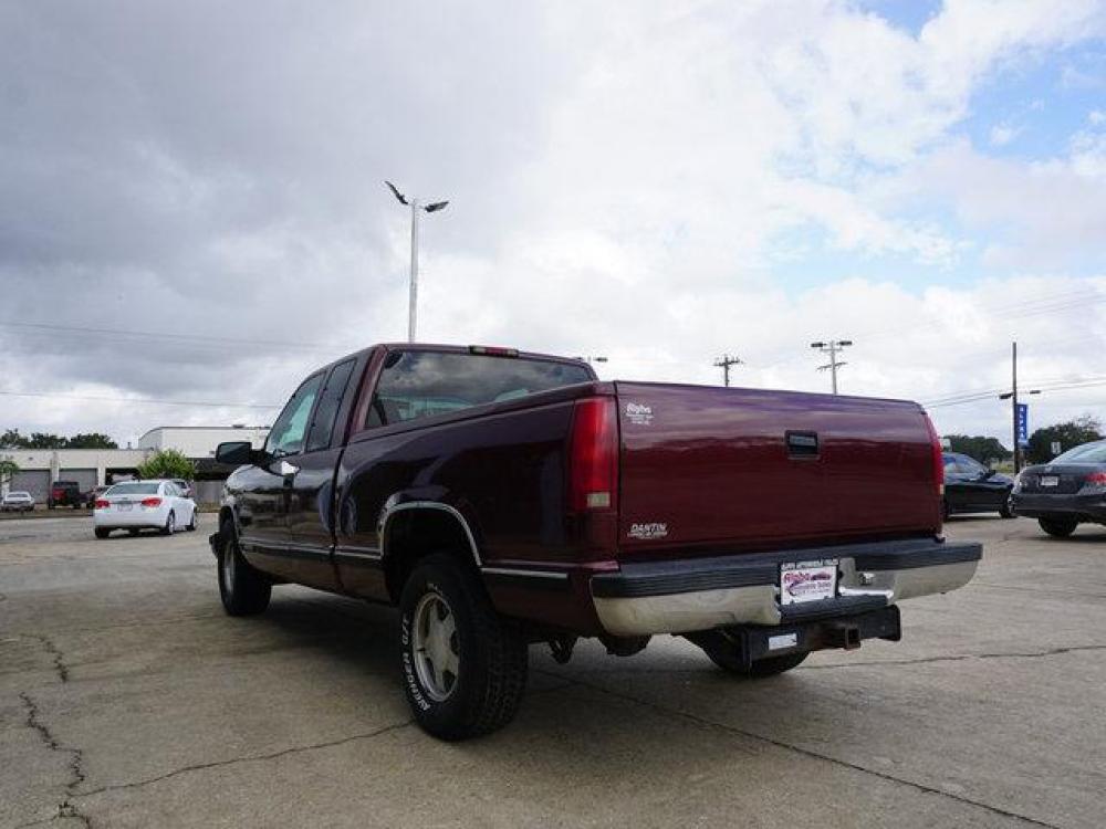1999 Red Chevrolet C1500 (1GCEC19R4XR) with an 5.7L V8 engine, 4 Spd Automatic transmission, located at 6904 Johnston St., Lafayette, LA, 70503, (337) 988-1960, 30.143589, -92.100601 - N/A. AC works, Runs and pulls good. May need a tune up. Its a money making Truck, use it for lawn, pulling, Painting, hauling, construction work and many other things for a start up business man. Has a small dent on the drivers door. Prices are subject to change as improvements done by the servi - Photo #5
