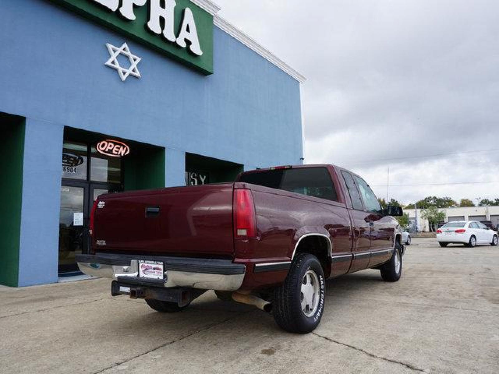 1999 Red Chevrolet C1500 (1GCEC19R4XR) with an 5.7L V8 engine, 4 Spd Automatic transmission, located at 6904 Johnston St., Lafayette, LA, 70503, (337) 988-1960, 30.143589, -92.100601 - N/A. AC works, Runs and pulls good. May need a tune up. Its a money making Truck, use it for lawn, pulling, Painting, hauling, construction work and many other things for a start up business man. Has a small dent on the drivers door. Prices are subject to change as improvements done by the servi - Photo #7