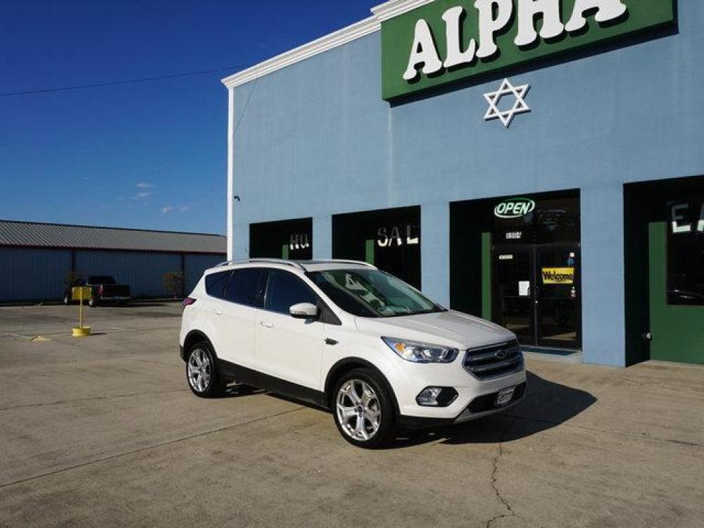 2017 White Ford Escape (1FMCU0J95HU) with an 2.0L 4Cyl Ecoboost engine, Automatic transmission, located at 6904 Johnston St., Lafayette, LA, 70503, (337) 988-1960, 30.143589, -92.100601 - Prices are subject to change as improvements done by the service dept. Prices are for Cash sales only, Plus TTL. This Vehicle is Serviced well and Warranties Available too. Easy Financing. Drives Great and everything works. Price subject to change as improvements done by the service dept. Easy CR - Photo #1
