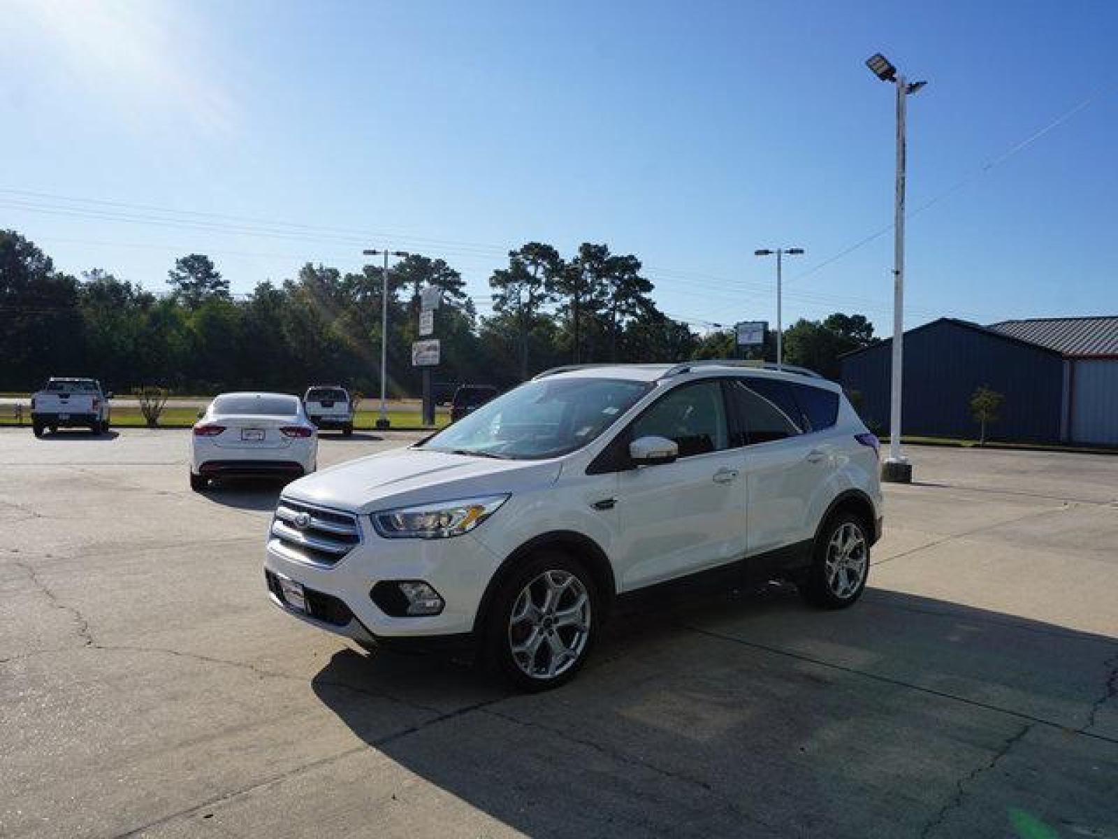 2017 White Ford Escape (1FMCU0J95HU) with an 2.0L 4Cyl Ecoboost engine, Automatic transmission, located at 6904 Johnston St., Lafayette, LA, 70503, (337) 988-1960, 30.143589, -92.100601 - Prices are subject to change as improvements done by the service dept. Prices are for Cash sales only, Plus TTL. This Vehicle is Serviced well and Warranties Available too. Easy Financing. Drives Great and everything works. Price subject to change as improvements done by the service dept. Easy CR - Photo #3