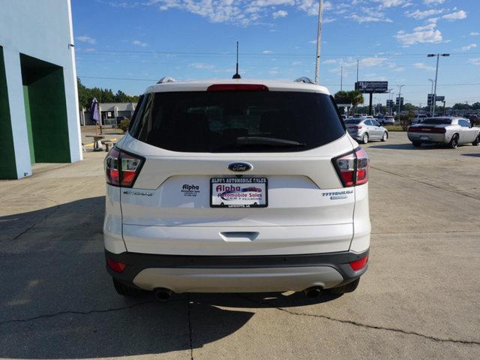 2017 White Ford Escape (1FMCU0J95HU) with an 2.0L 4Cyl Ecoboost engine, Automatic transmission, located at 6904 Johnston St., Lafayette, LA, 70503, (337) 988-1960, 30.143589, -92.100601 - Prices are subject to change as improvements done by the service dept. Prices are for Cash sales only, Plus TTL. This Vehicle is Serviced well and Warranties Available too. Easy Financing. Drives Great and everything works. Price subject to change as improvements done by the service dept. Easy CR - Photo #6
