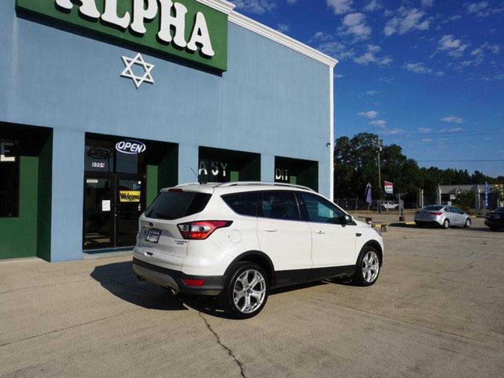 2017 White Ford Escape (1FMCU0J95HU) with an 2.0L 4Cyl Ecoboost engine, Automatic transmission, located at 6904 Johnston St., Lafayette, LA, 70503, (337) 988-1960, 30.143589, -92.100601 - Prices are subject to change as improvements done by the service dept. Prices are for Cash sales only, Plus TTL. This Vehicle is Serviced well and Warranties Available too. Easy Financing. Drives Great and everything works. Price subject to change as improvements done by the service dept. Easy CR - Photo #7