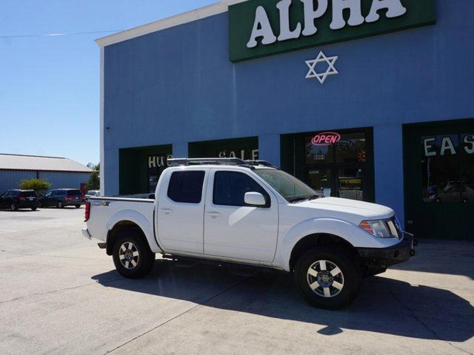 2013 White Nissan Frontier (1N6AD0EV5DN) with an 4.0L V6 engine, Automatic transmission, located at 6904 Johnston St., Lafayette, LA, 70503, (337) 988-1960, 30.143589, -92.100601 - Prices are subject to change as improvements done by the service dept. Prices are for Cash sales only, Plus TTL. This Vehicle is Serviced well and Warranties Available too. Easy Financing. Drives Great and everything works. Price subject to change as improvements done by the service dept. Easy CR - Photo #1