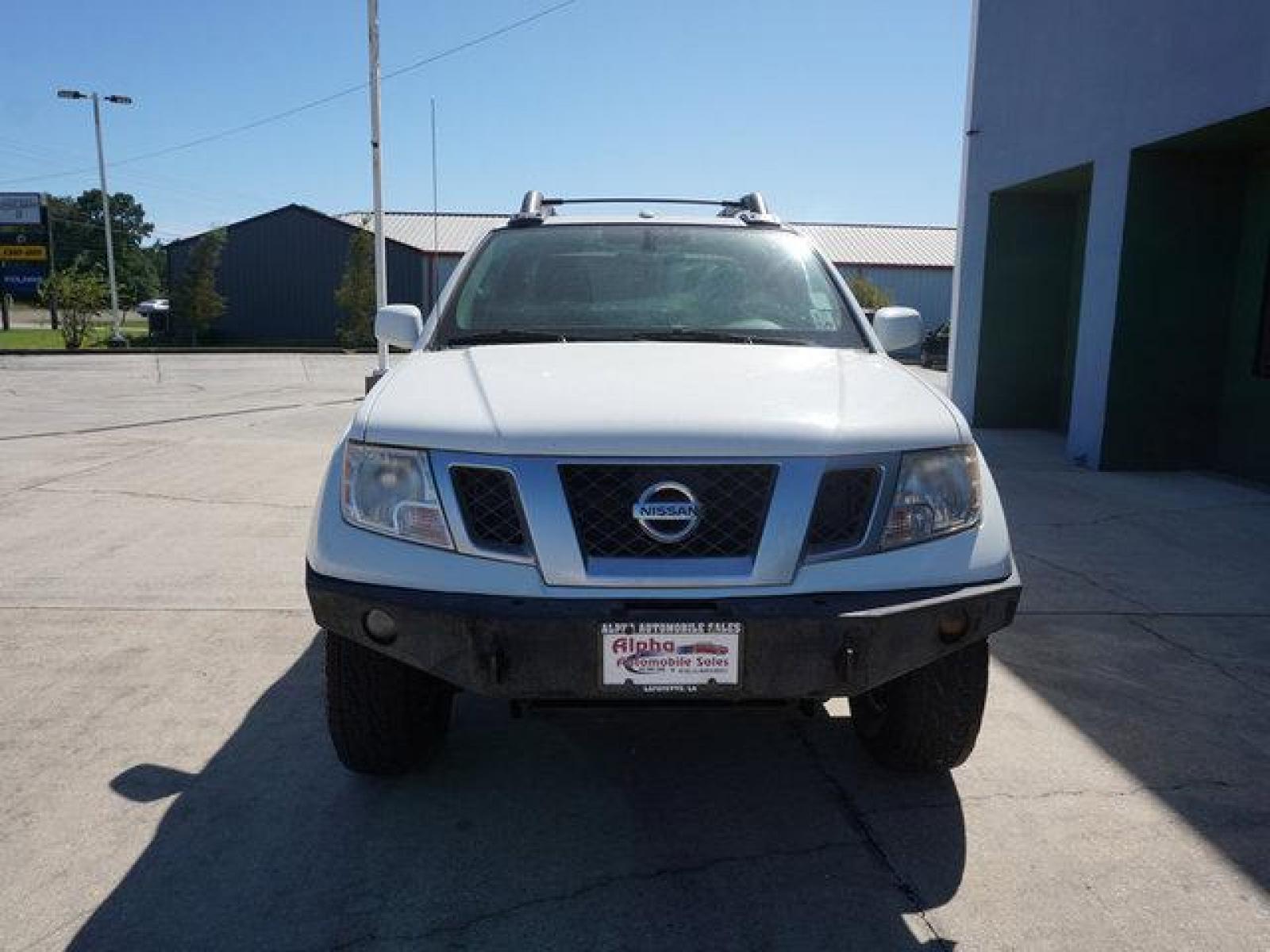 2013 White Nissan Frontier (1N6AD0EV5DN) with an 4.0L V6 engine, Automatic transmission, located at 6904 Johnston St., Lafayette, LA, 70503, (337) 988-1960, 30.143589, -92.100601 - Prices are subject to change as improvements done by the service dept. Prices are for Cash sales only, Plus TTL. This Vehicle is Serviced well and Warranties Available too. Easy Financing. Drives Great and everything works. Price subject to change as improvements done by the service dept. Easy CR - Photo #2