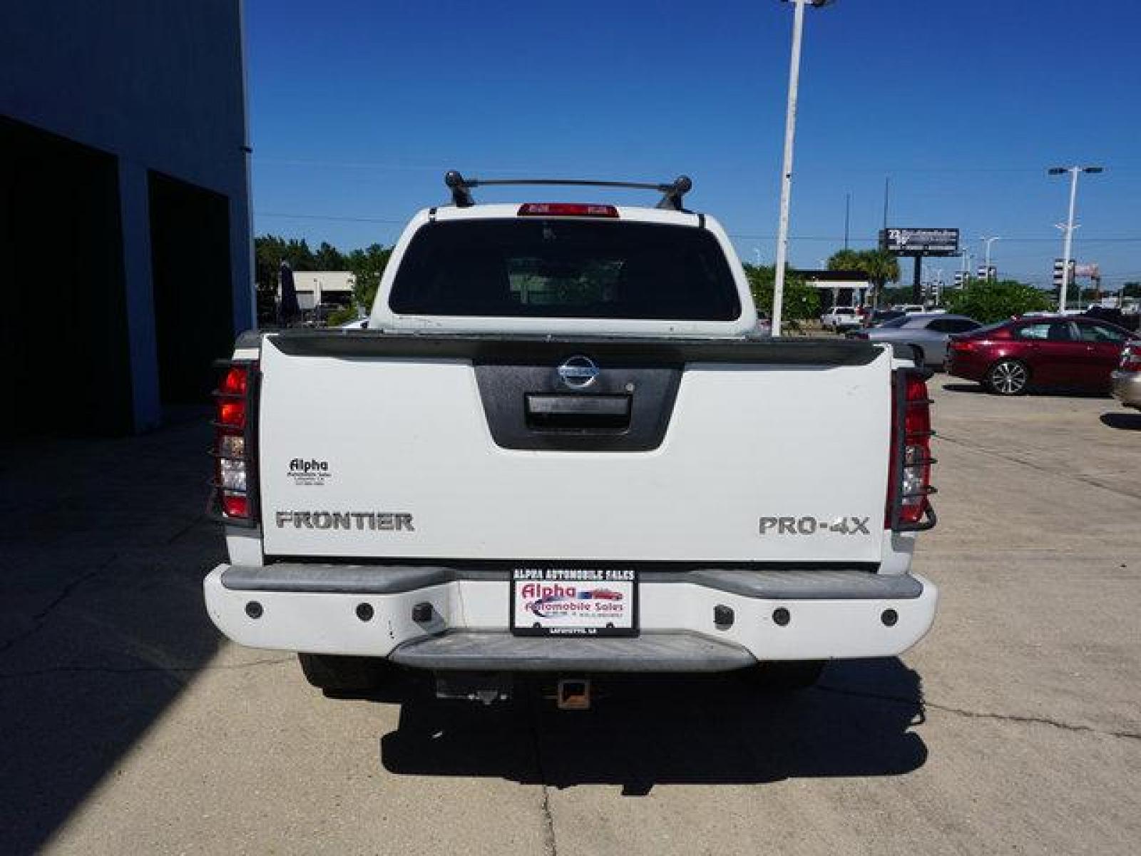 2013 White Nissan Frontier (1N6AD0EV5DN) with an 4.0L V6 engine, Automatic transmission, located at 6904 Johnston St., Lafayette, LA, 70503, (337) 988-1960, 30.143589, -92.100601 - Prices are subject to change as improvements done by the service dept. Prices are for Cash sales only, Plus TTL. This Vehicle is Serviced well and Warranties Available too. Easy Financing. Drives Great and everything works. Price subject to change as improvements done by the service dept. Easy CR - Photo #6