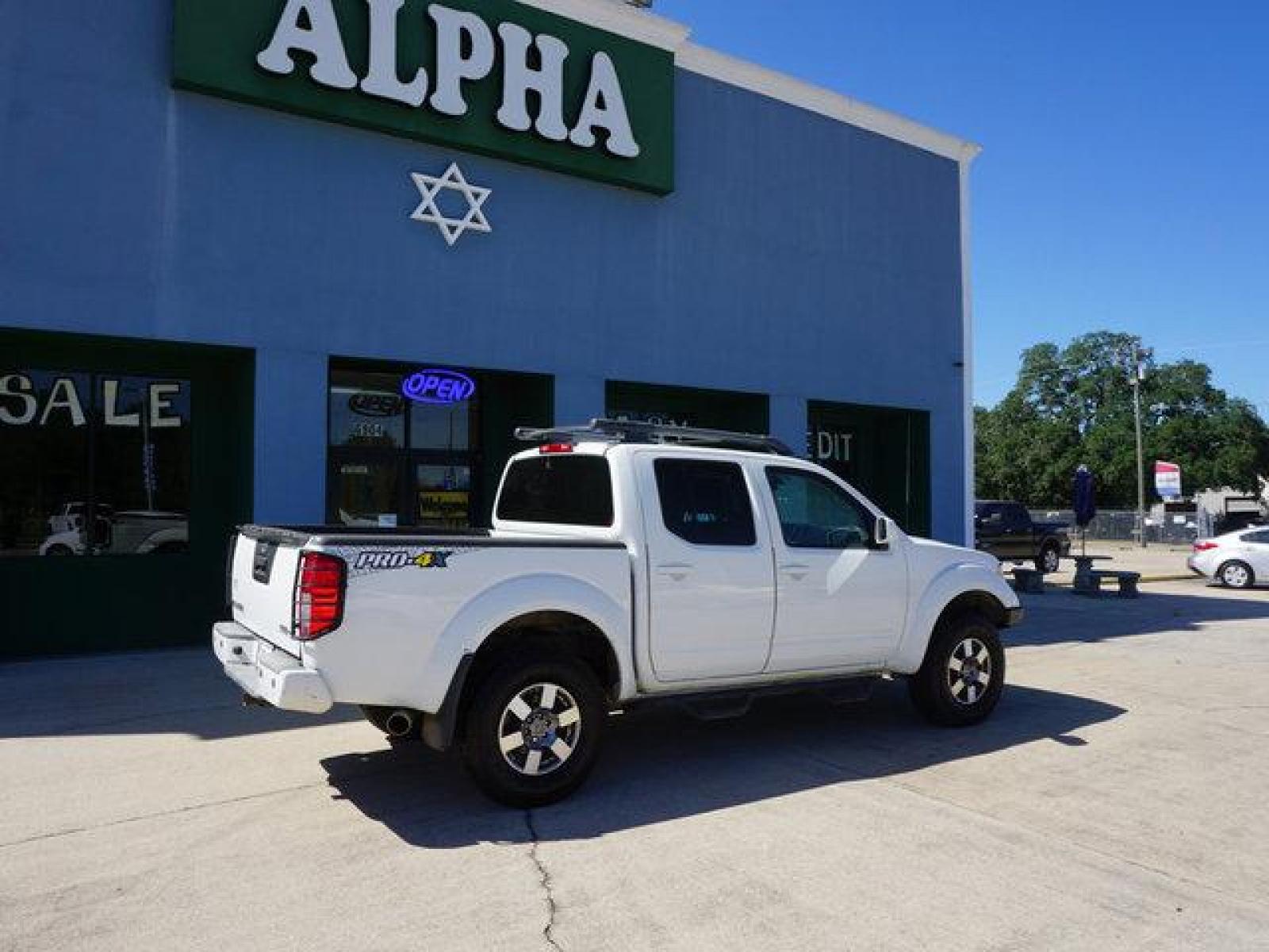 2013 White Nissan Frontier (1N6AD0EV5DN) with an 4.0L V6 engine, Automatic transmission, located at 6904 Johnston St., Lafayette, LA, 70503, (337) 988-1960, 30.143589, -92.100601 - Prices are subject to change as improvements done by the service dept. Prices are for Cash sales only, Plus TTL. This Vehicle is Serviced well and Warranties Available too. Easy Financing. Drives Great and everything works. Price subject to change as improvements done by the service dept. Easy CR - Photo #7