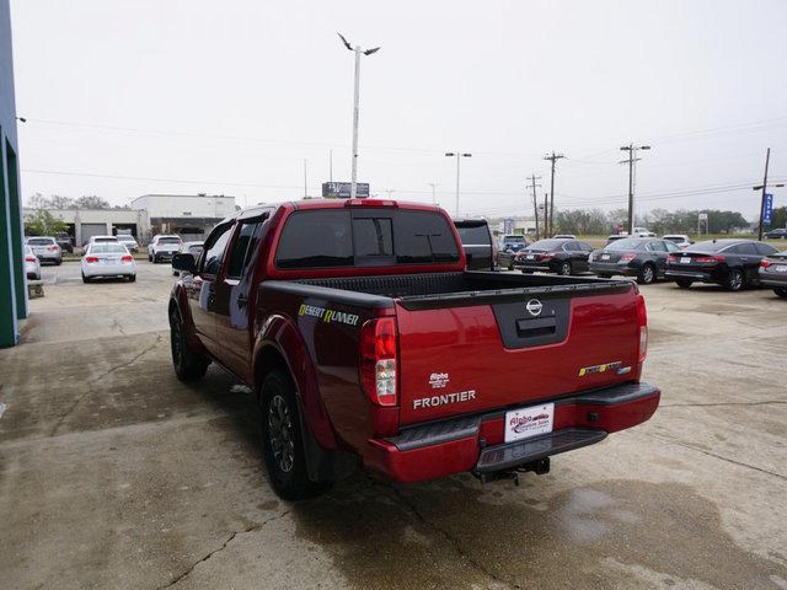 2018 Red Nissan Frontier (1N6DD0ER0JN) with an 4.0L V6 engine, Automatic transmission, located at 6904 Johnston St., Lafayette, LA, 70503, (337) 988-1960, 30.143589, -92.100601 - Prices are subject to change as improvements done by the service dept. Prices are for Cash sales only, Plus TTL. This Vehicle is Serviced well and Warranties Available too. Easy Financing. Drives Great and everything works. Price subject to change as improvements done by the service dept. Easy CR - Photo #9