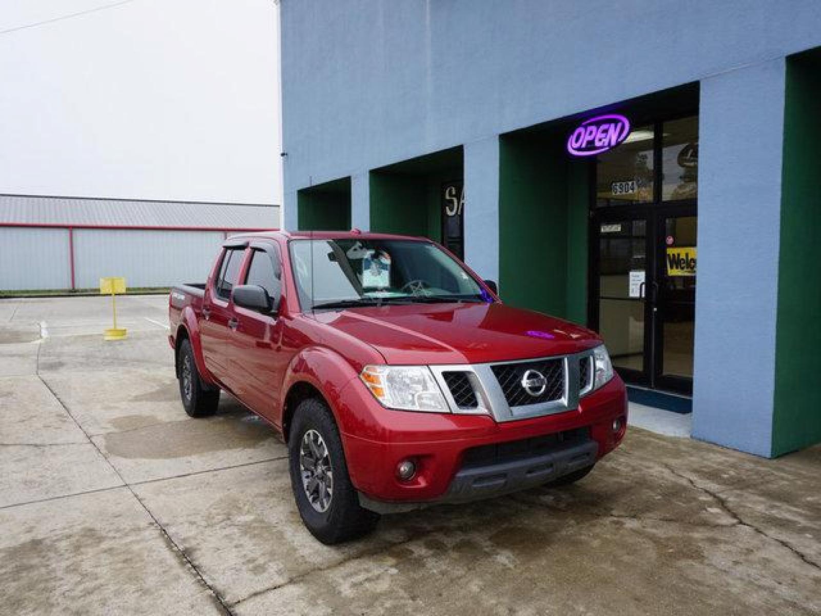 2018 Red Nissan Frontier (1N6DD0ER0JN) with an 4.0L V6 engine, Automatic transmission, located at 6904 Johnston St., Lafayette, LA, 70503, (337) 988-1960, 30.143589, -92.100601 - Prices are subject to change as improvements done by the service dept. Prices are for Cash sales only, Plus TTL. This Vehicle is Serviced well and Warranties Available too. Easy Financing. Drives Great and everything works. Price subject to change as improvements done by the service dept. Easy CR - Photo #2