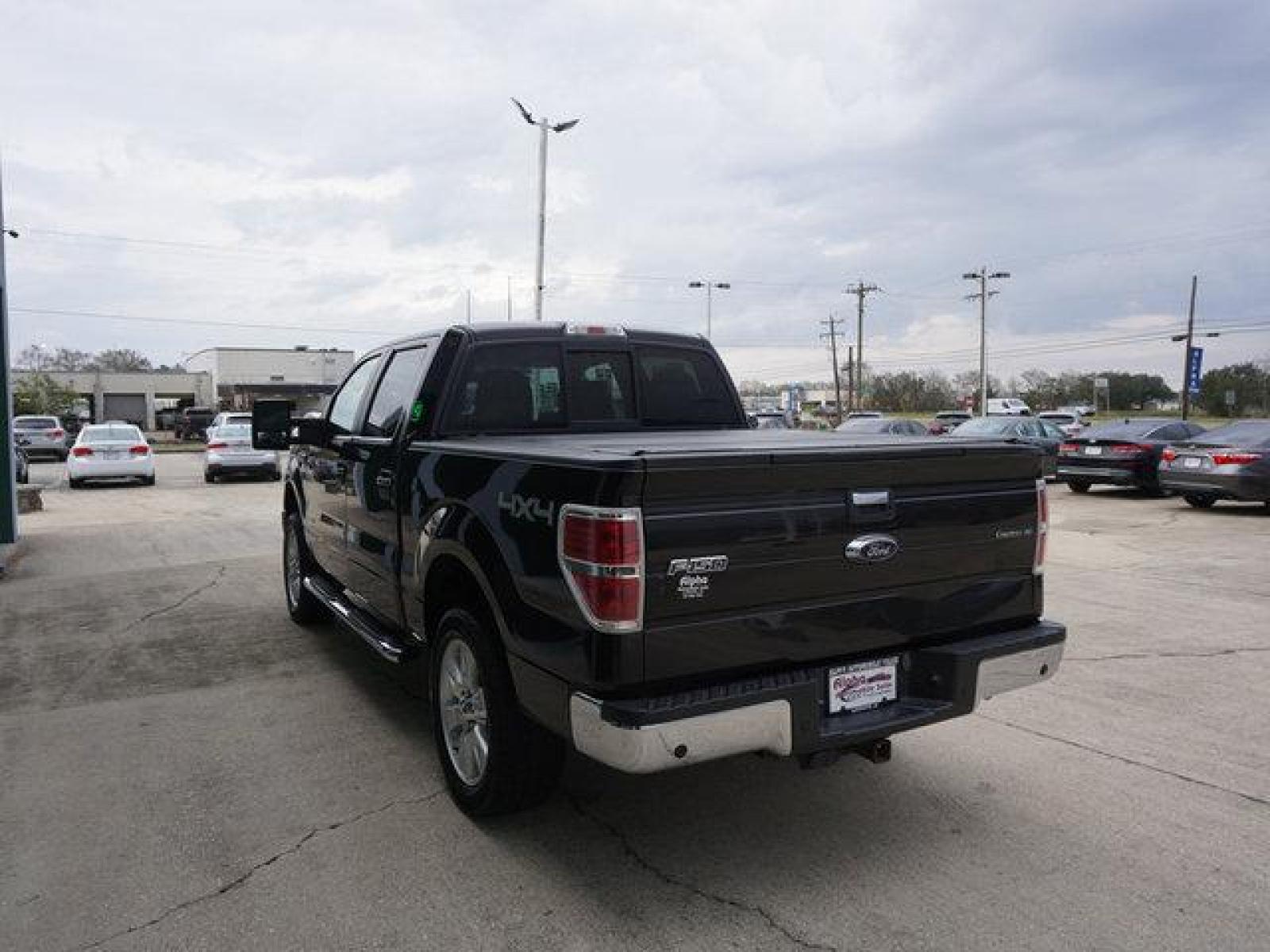 2014 Black Ford F-150 (1FTFW1ET8EF) with an 3.5L V6 EcoBoost engine, 6 Spd Automatic transmission, located at 6904 Johnston St., Lafayette, LA, 70503, (337) 988-1960, 30.143589, -92.100601 - A beautiful Truck. Well Kept. 100% Mechanically certified that No issues. Prices are subject to change as improvements done by the service dept. Prices are for Cash sales only, Plus TTL. This Vehicle is Serviced well and Warranties Available too. Easy Financing. Drives Great and everything works - Photo #9