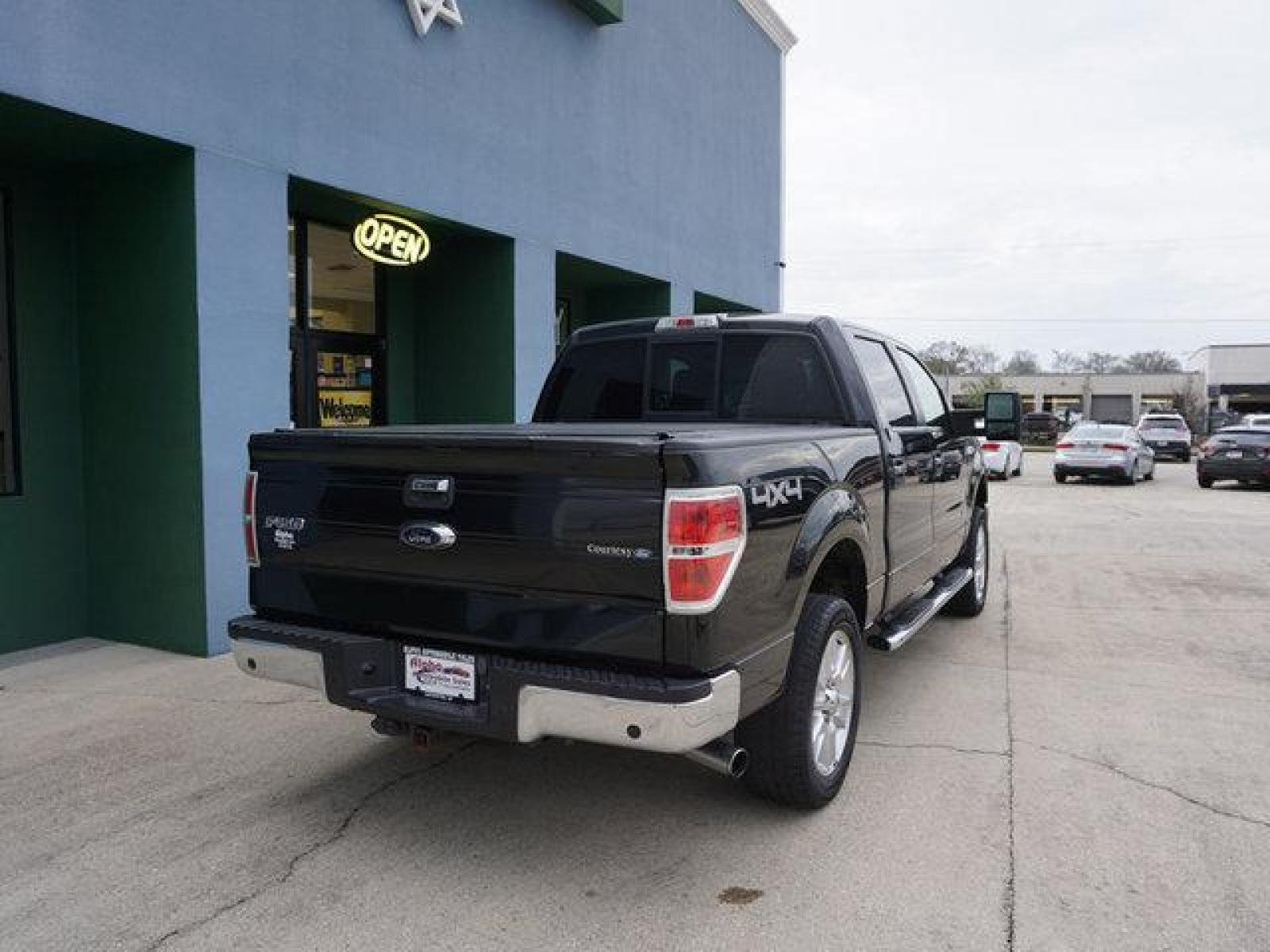 2014 Black Ford F-150 (1FTFW1ET8EF) with an 3.5L V6 EcoBoost engine, 6 Spd Automatic transmission, located at 6904 Johnston St., Lafayette, LA, 70503, (337) 988-1960, 30.143589, -92.100601 - A beautiful Truck. Well Kept. 100% Mechanically certified that No issues. Prices are subject to change as improvements done by the service dept. Prices are for Cash sales only, Plus TTL. This Vehicle is Serviced well and Warranties Available too. Easy Financing. Drives Great and everything works - Photo #12