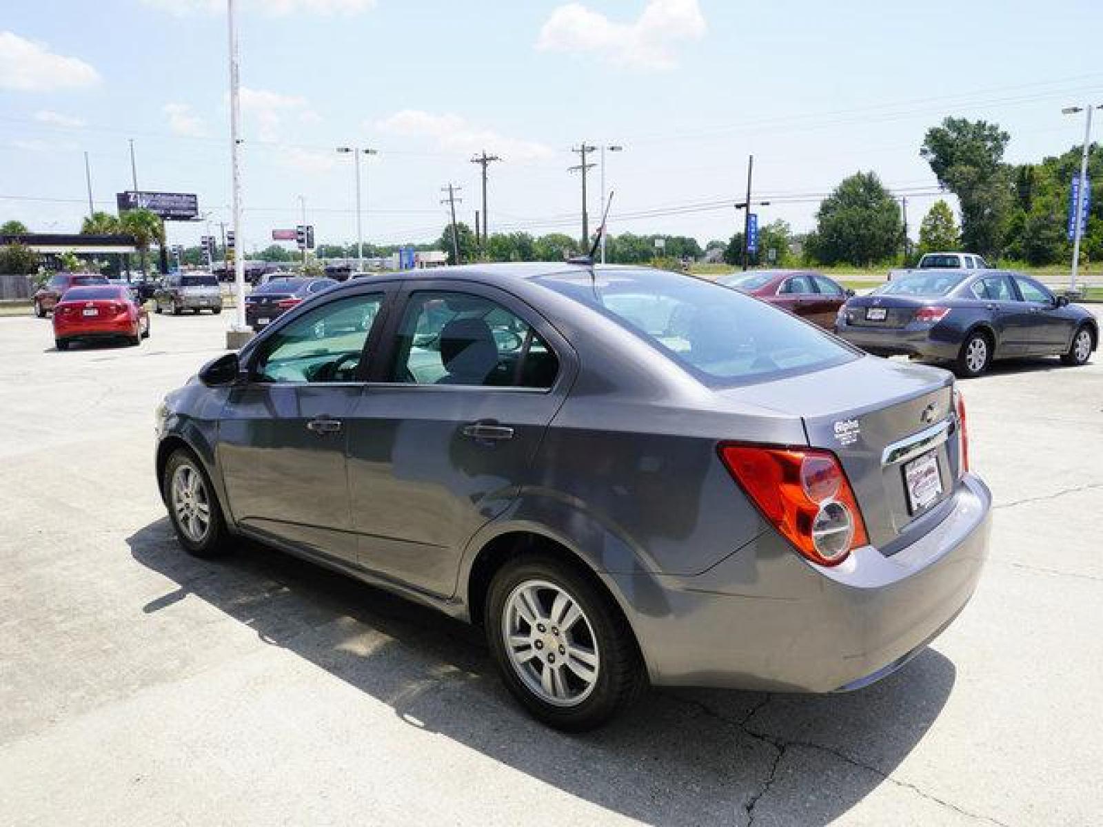 2013 Gray Chevrolet Sonic (1G1JC5SB9D4) with an 1.4L 4Cyl Turbo engine, Automatic transmission, located at 6904 Johnston St., Lafayette, LA, 70503, (337) 988-1960, 30.143589, -92.100601 - Gas Saver. Save money! Nice and cheap. Has Smart screen Digital 10 inches SCREEN nice for radio / audio display. Prices are subject to change as improvements done by the service dept. Prices are for Cash sales only, Plus TTL. This Vehicle is Serviced well and Warranties Available too. Easy Finan - Photo #9