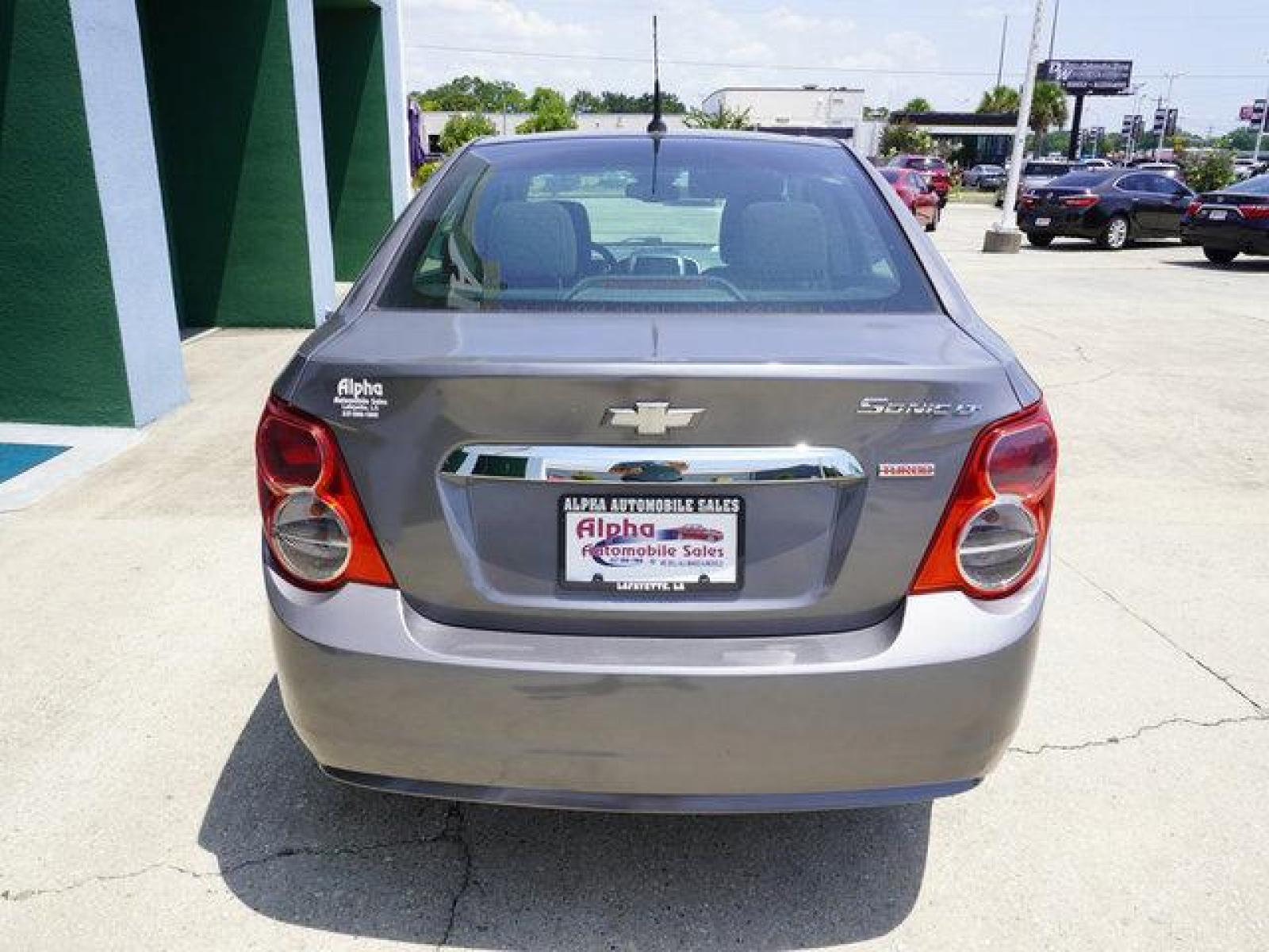 2013 Gray Chevrolet Sonic (1G1JC5SB9D4) with an 1.4L 4Cyl Turbo engine, Automatic transmission, located at 6904 Johnston St., Lafayette, LA, 70503, (337) 988-1960, 30.143589, -92.100601 - Gas Saver. Save money! Nice and cheap. Has Smart screen Digital 10 inches SCREEN nice for radio / audio display. Prices are subject to change as improvements done by the service dept. Prices are for Cash sales only, Plus TTL. This Vehicle is Serviced well and Warranties Available too. Easy Finan - Photo #10