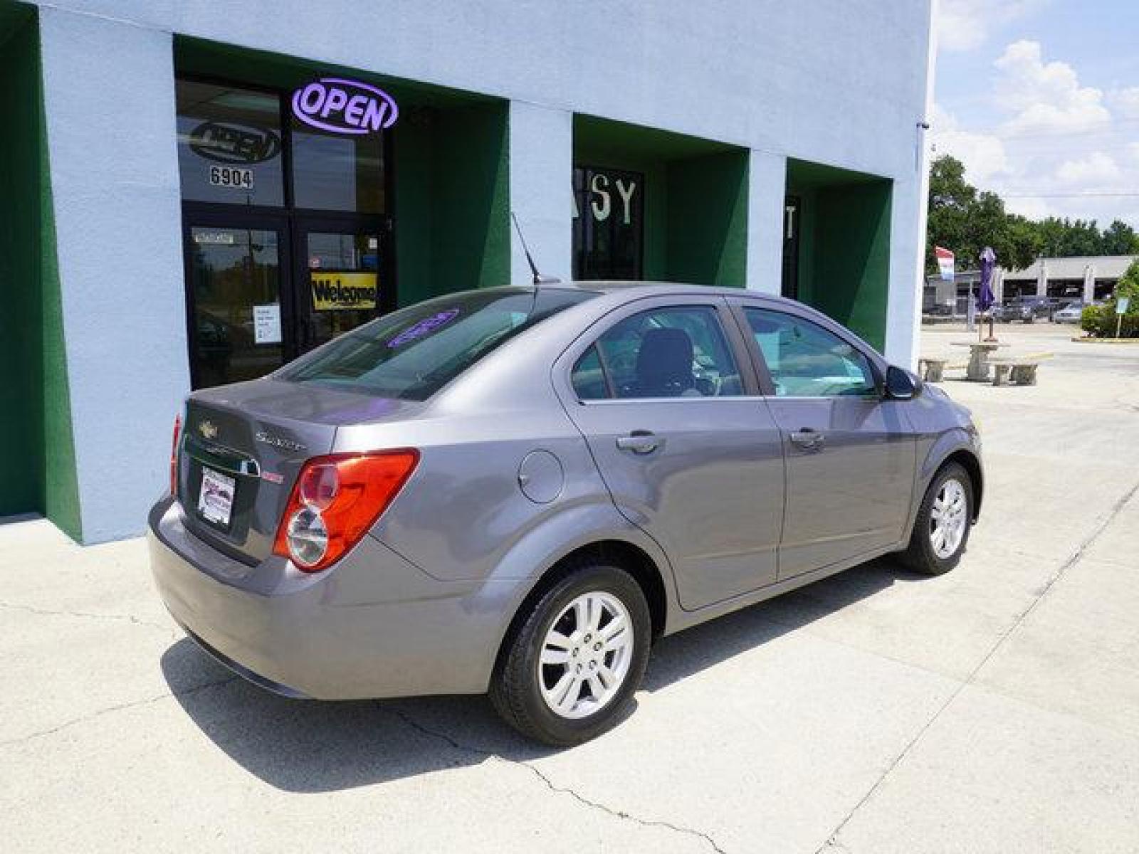 2013 Gray Chevrolet Sonic (1G1JC5SB9D4) with an 1.4L 4Cyl Turbo engine, Automatic transmission, located at 6904 Johnston St., Lafayette, LA, 70503, (337) 988-1960, 30.143589, -92.100601 - Gas Saver, It is a Reconstructed Title when it was traded In. Prices are subject to change as improvements done by the service dept. Prices are for Cash sales only, Plus TTL. This Vehicle is Serviced well and Warranties Available too. Easy Financing. Drives Great and everything works. Price subj - Photo #12
