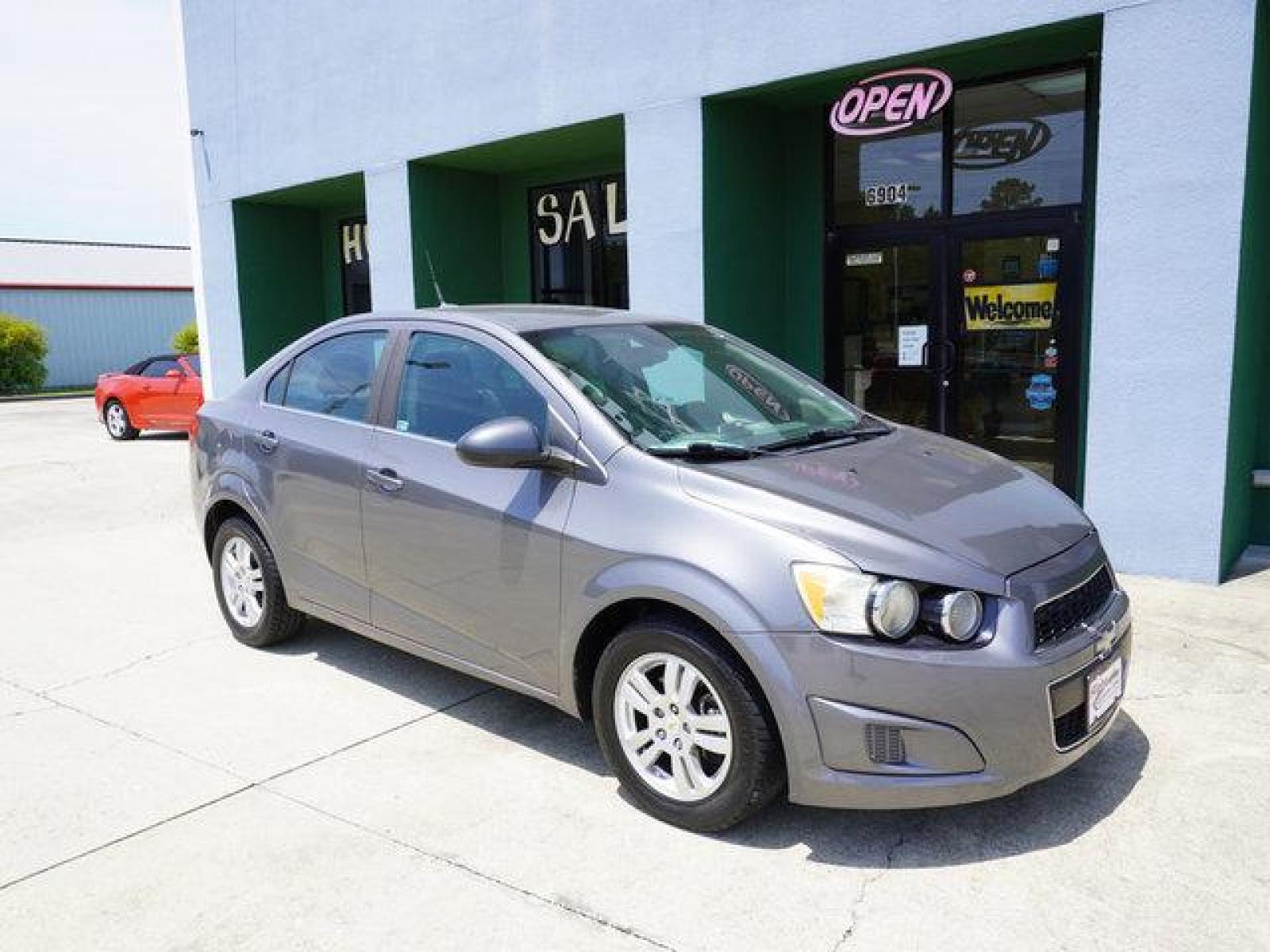 2013 Gray Chevrolet Sonic (1G1JC5SB9D4) with an 1.4L 4Cyl Turbo engine, Automatic transmission, located at 6904 Johnston St., Lafayette, LA, 70503, (337) 988-1960, 30.143589, -92.100601 - Gas Saver, It is a Reconstructed Title when it was traded In. Prices are subject to change as improvements done by the service dept. Prices are for Cash sales only, Plus TTL. This Vehicle is Serviced well and Warranties Available too. Easy Financing. Drives Great and everything works. Price subj - Photo #2