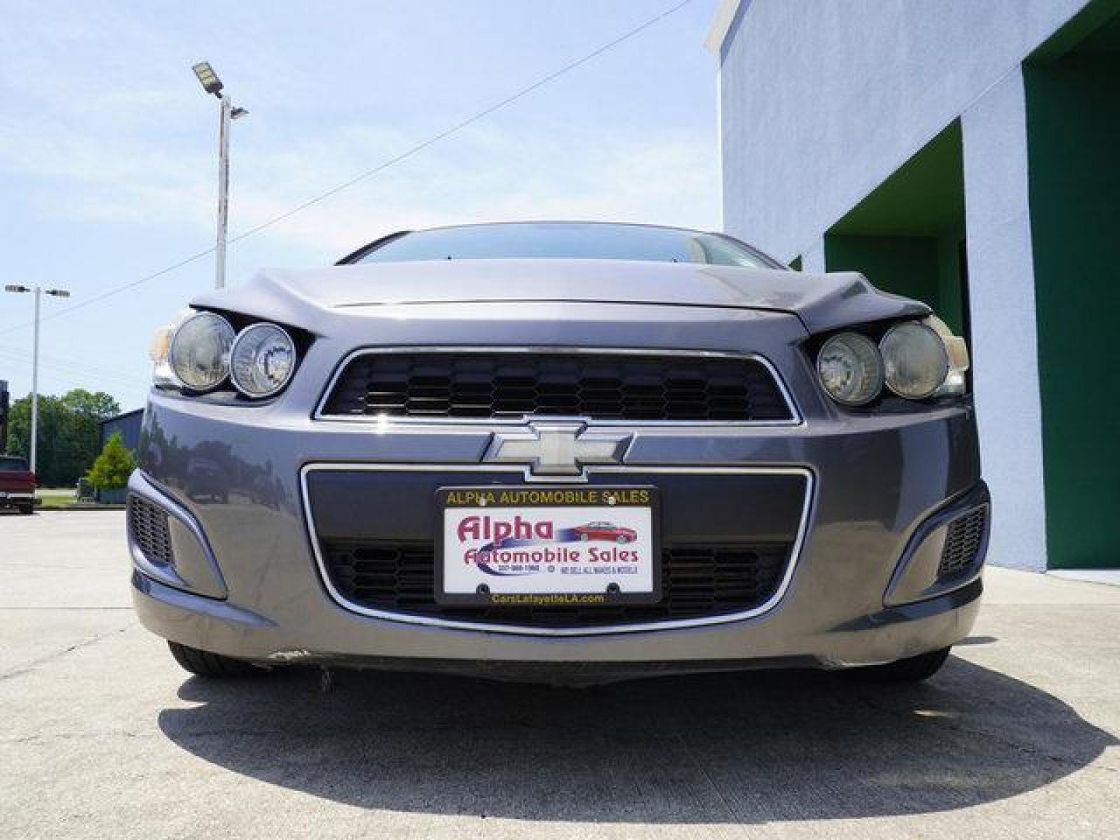 2013 Gray Chevrolet Sonic (1G1JC5SB9D4) with an 1.4L 4Cyl Turbo engine, Automatic transmission, located at 6904 Johnston St., Lafayette, LA, 70503, (337) 988-1960, 30.143589, -92.100601 - Gas Saver, It is a Reconstructed Title when it was traded In. Prices are subject to change as improvements done by the service dept. Prices are for Cash sales only, Plus TTL. This Vehicle is Serviced well and Warranties Available too. Easy Financing. Drives Great and everything works. Price subj - Photo #3