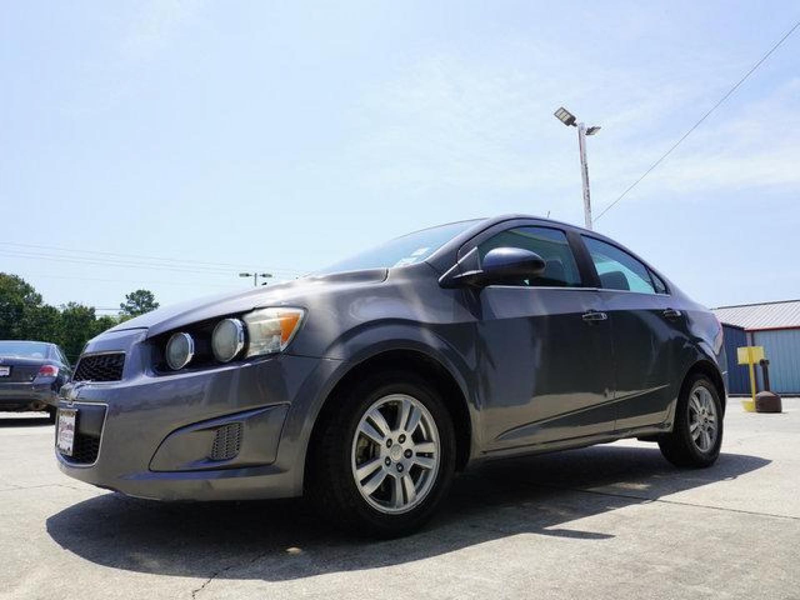 2013 Gray Chevrolet Sonic (1G1JC5SB9D4) with an 1.4L 4Cyl Turbo engine, Automatic transmission, located at 6904 Johnston St., Lafayette, LA, 70503, (337) 988-1960, 30.143589, -92.100601 - Gas Saver, It is a Reconstructed Title when it was traded In. Prices are subject to change as improvements done by the service dept. Prices are for Cash sales only, Plus TTL. This Vehicle is Serviced well and Warranties Available too. Easy Financing. Drives Great and everything works. Price subj - Photo #5