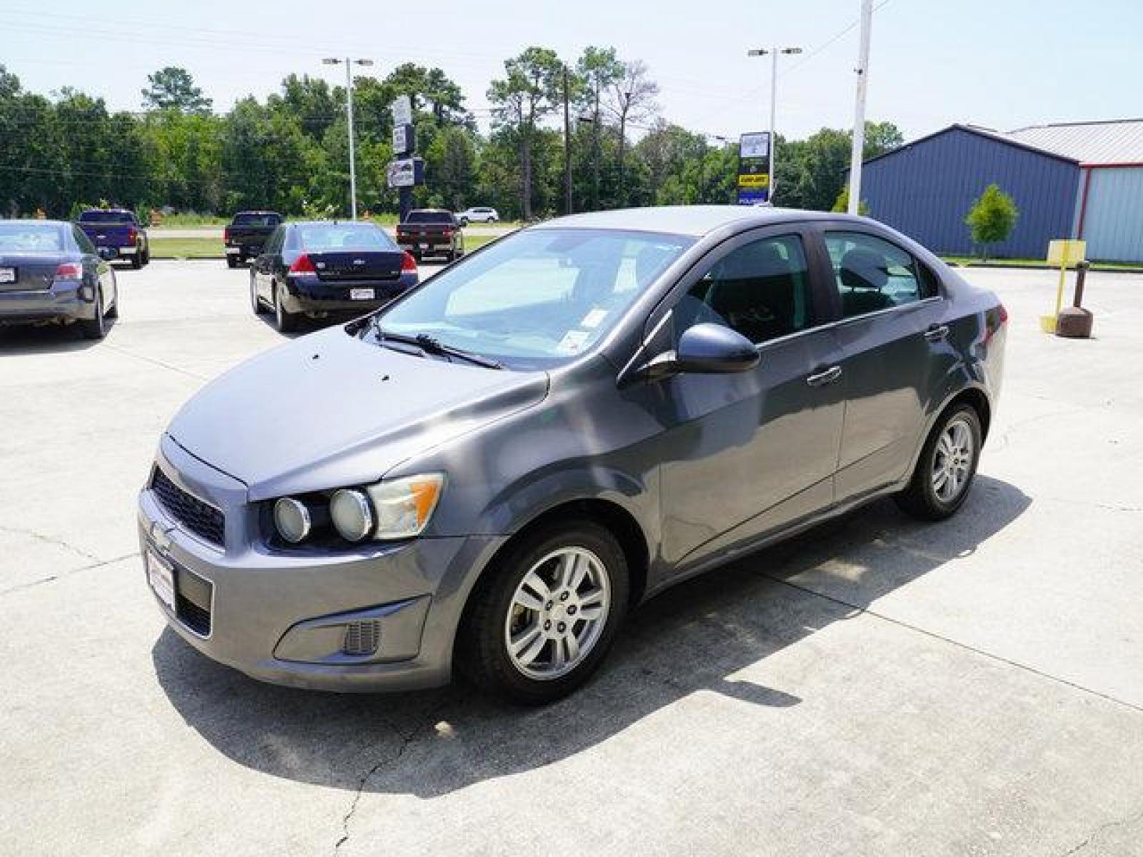 2013 Gray Chevrolet Sonic (1G1JC5SB9D4) with an 1.4L 4Cyl Turbo engine, Automatic transmission, located at 6904 Johnston St., Lafayette, LA, 70503, (337) 988-1960, 30.143589, -92.100601 - Gas Saver, It is a Reconstructed Title when it was traded In. Prices are subject to change as improvements done by the service dept. Prices are for Cash sales only, Plus TTL. This Vehicle is Serviced well and Warranties Available too. Easy Financing. Drives Great and everything works. Price subj - Photo #6