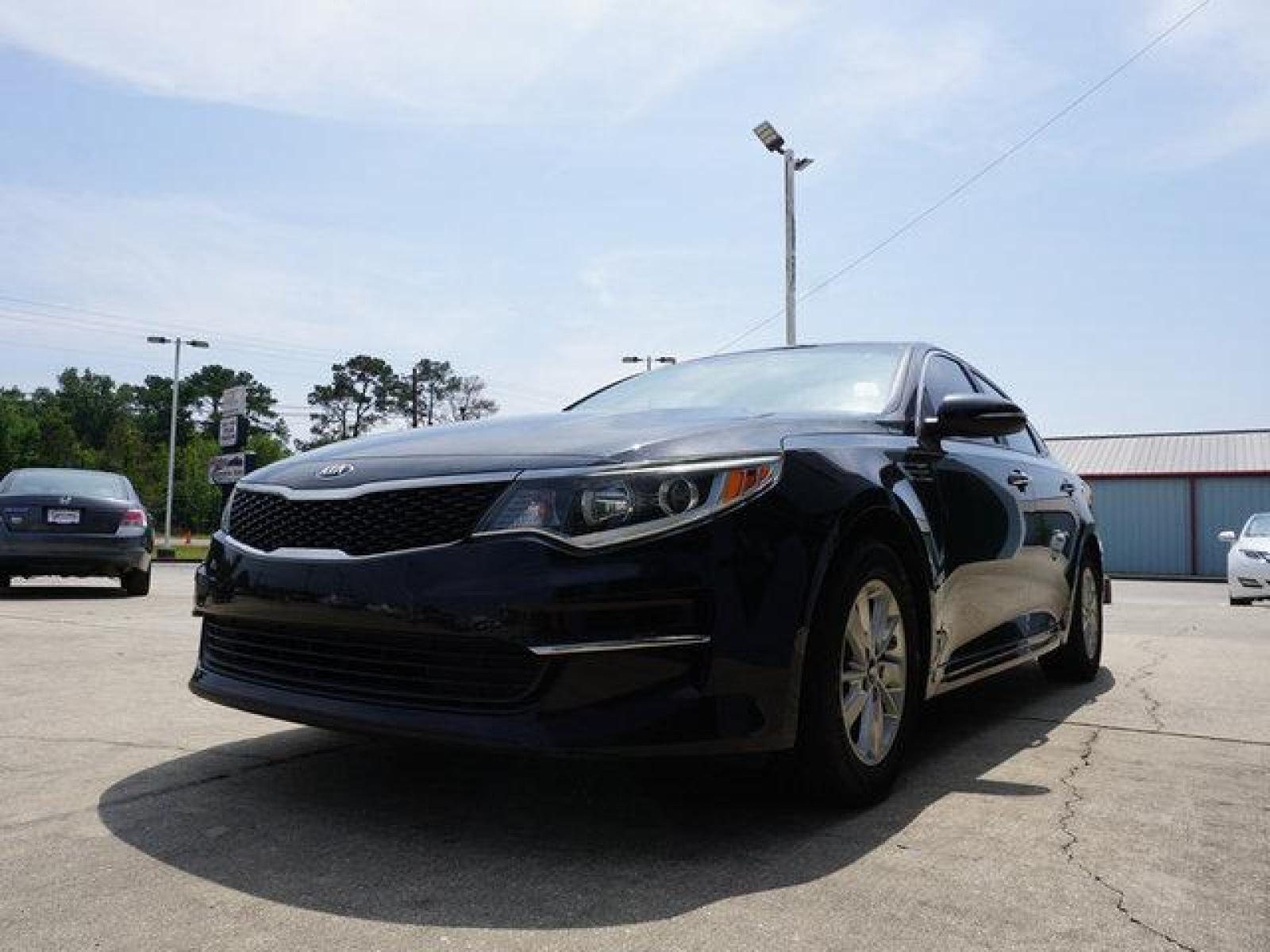 2016 Black Kia Optima (5XXGT4L30GG) with an 2.4L 4Cyl engine, 6 Spd Automatic transmission, located at 6904 Johnston St., Lafayette, LA, 70503, (337) 988-1960, 30.143589, -92.100601 - Prices are subject to change as improvements done by the service dept. Prices are for Cash sales only, Plus TTL. This Vehicle is Serviced well and Warranties Available too. Easy Financing. Drives Great and everything works. Price subject to change as improvements done by the service dept. Easy CR - Photo #5