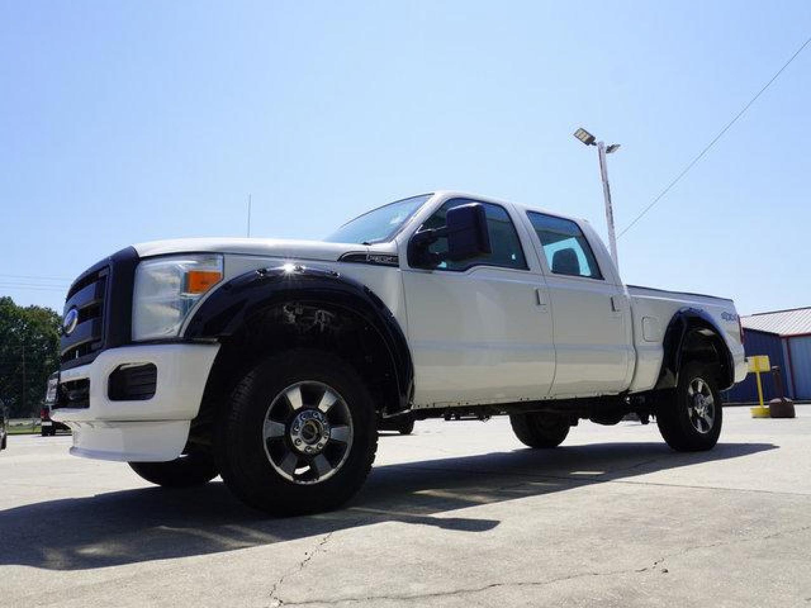 2014 White Ford F-350 (1FT8W3B66EE) with an 6.2L 8 Cyl engine, 6 Spd Automatic transmission, located at 6904 Johnston St., Lafayette, LA, 70503, (337) 988-1960, 30.143589, -92.100601 - Prices are subject to change as improvements done by the service dept. Prices are for Cash sales only, Plus TTL. This Vehicle is Serviced well and Warranties Available too. Easy Financing. Drives Great and everything works. Price subject to change as improvements done by the service dept. Easy CR - Photo #5