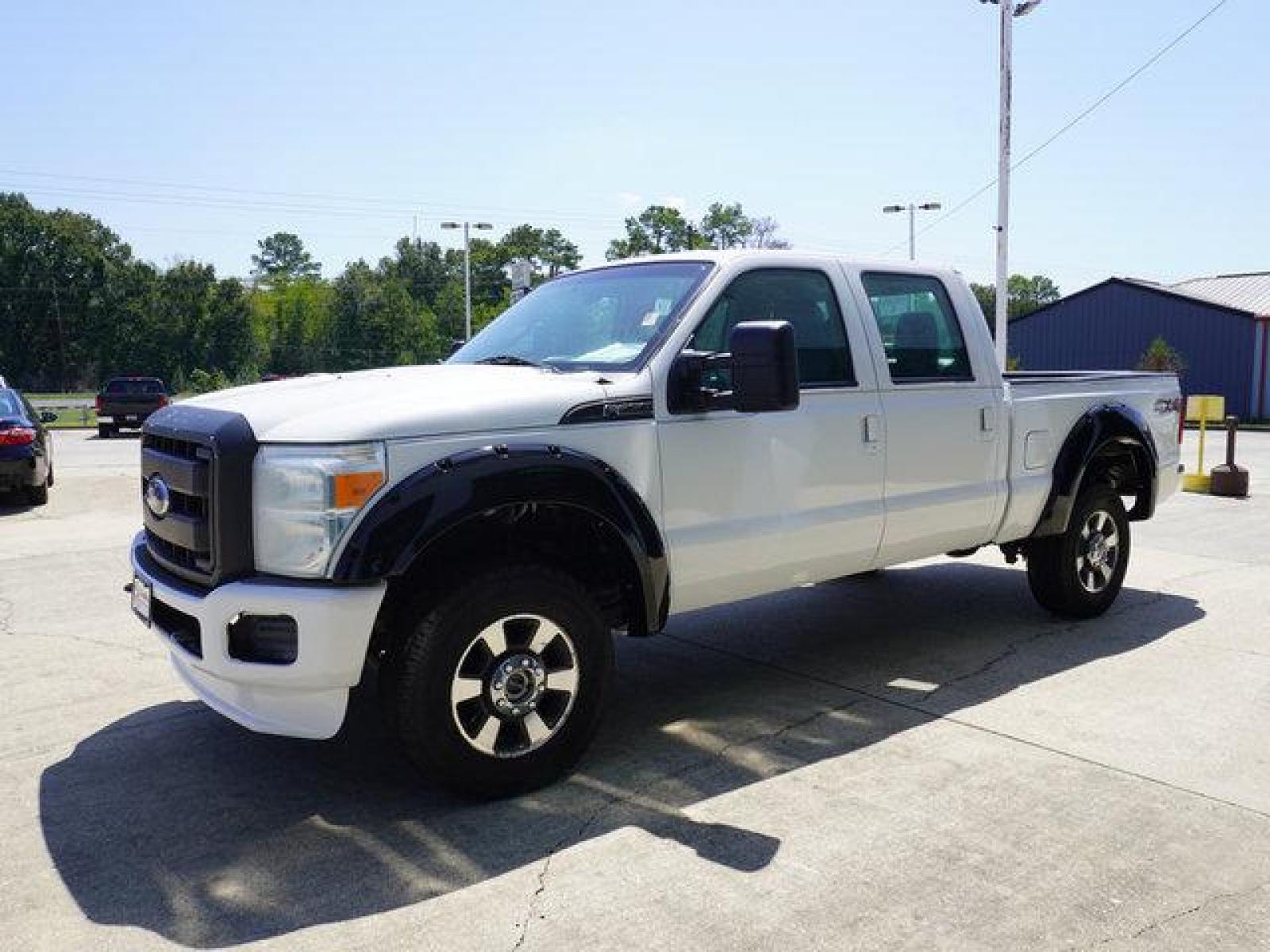 2014 White Ford F-350 (1FT8W3B66EE) with an 6.2L 8 Cyl engine, 6 Spd Automatic transmission, located at 6904 Johnston St., Lafayette, LA, 70503, (337) 988-1960, 30.143589, -92.100601 - Prices are subject to change as improvements done by the service dept. Prices are for Cash sales only, Plus TTL. This Vehicle is Serviced well and Warranties Available too. Easy Financing. Drives Great and everything works. Price subject to change as improvements done by the service dept. Easy CR - Photo #6