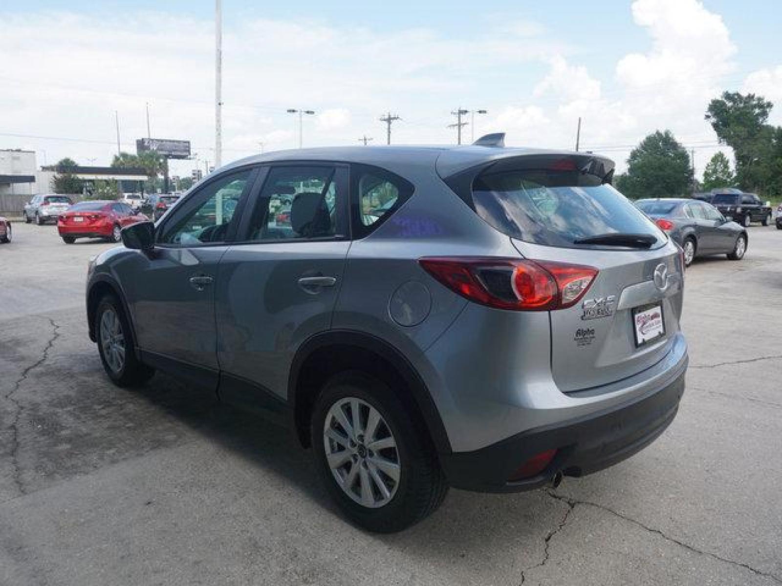 2014 Gray Mazda CX-5 (JM3KE2BE2E0) with an 2.0L 4 Cyl engine, Automatic transmission, located at 6904 Johnston St., Lafayette, LA, 70503, (337) 988-1960, 30.143589, -92.100601 - Prices are subject to change as improvements done by the service dept. Prices are for Cash sales only, Plus TTL. This Vehicle is Serviced well and Warranties Available too. Easy Financing. Drives Great and everything works. Price subject to change as improvements done by the service dept. Easy CR - Photo #9