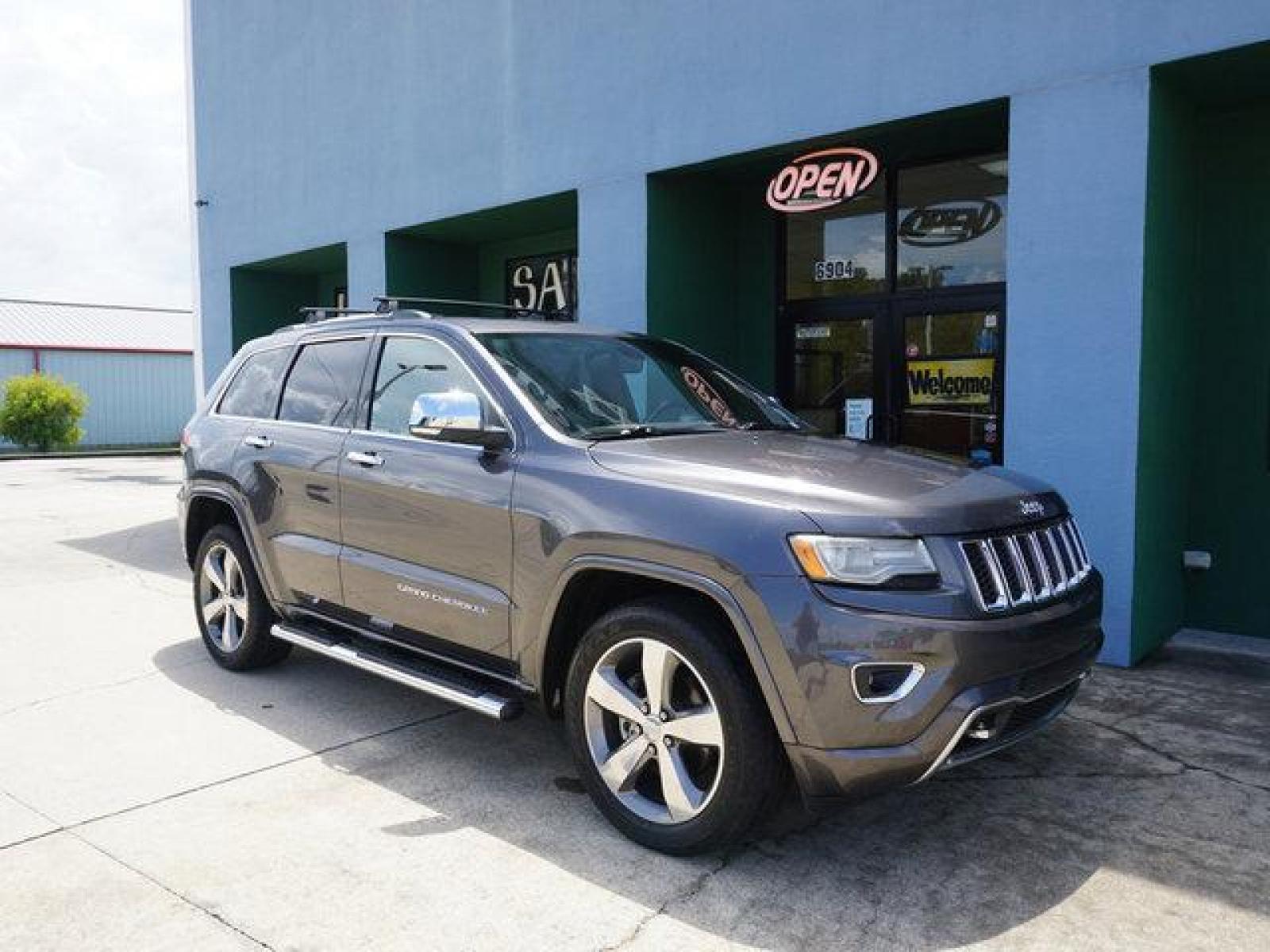 2014 Gray Jeep Grand Cherokee (1C4RJECT2EC) with an 5.7L V8 engine, 8 Spd Automatic transmission, located at 6904 Johnston St., Lafayette, LA, 70503, (337) 988-1960, 30.143589, -92.100601 - Prices are subject to change as improvements done by the service dept. Prices are for Cash sales only, Plus TTL. This Vehicle is Serviced well and Warranties Available too. Easy Financing. Drives Great and everything works. Price subject to change as improvements done by the service dept. Easy CR - Photo #2