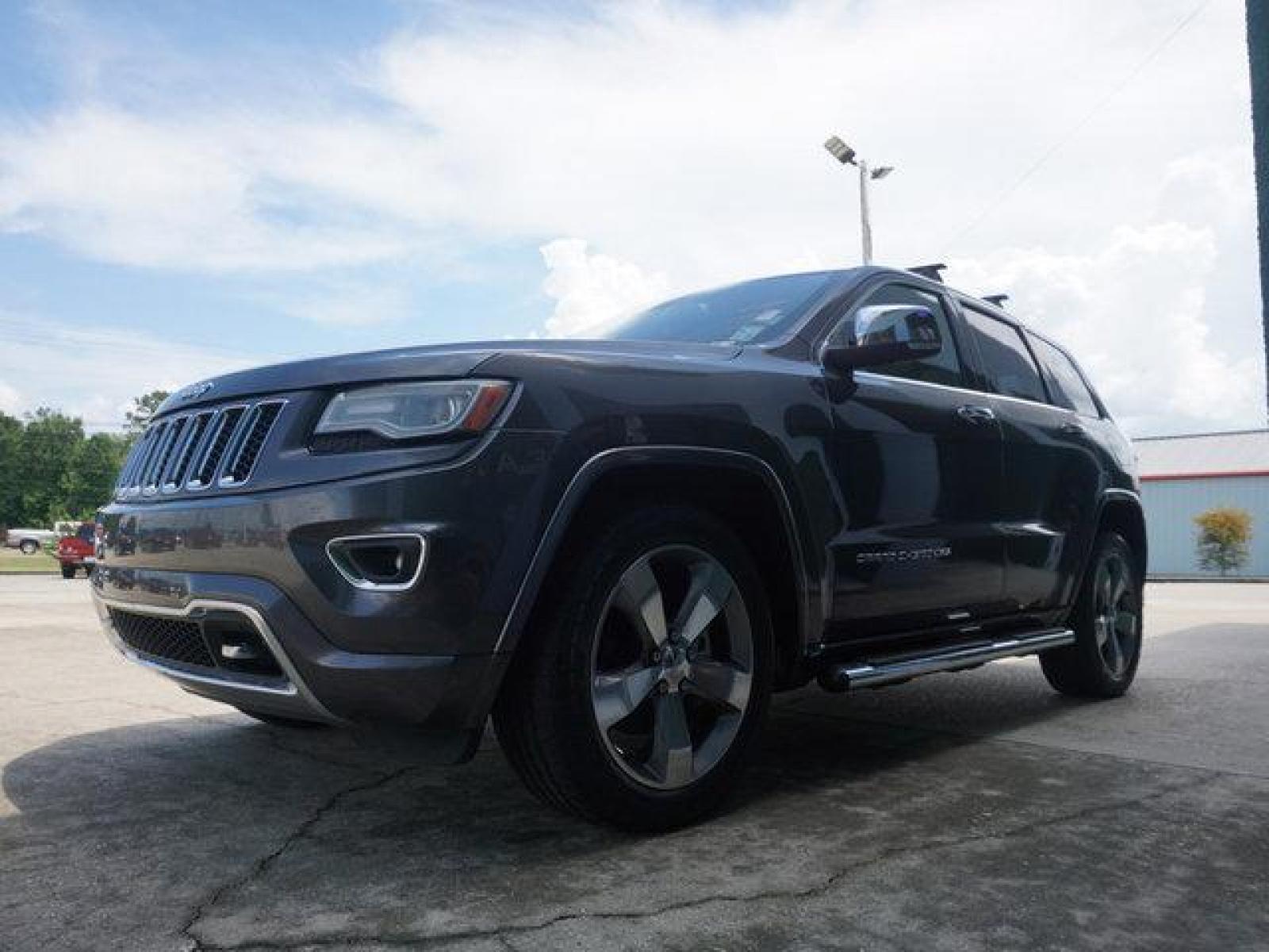 2014 Gray Jeep Grand Cherokee (1C4RJECT2EC) with an 5.7L V8 engine, 8 Spd Automatic transmission, located at 6904 Johnston St., Lafayette, LA, 70503, (337) 988-1960, 30.143589, -92.100601 - Prices are subject to change as improvements done by the service dept. Prices are for Cash sales only, Plus TTL. This Vehicle is Serviced well and Warranties Available too. Easy Financing. Drives Great and everything works. Price subject to change as improvements done by the service dept. Easy CR - Photo #5