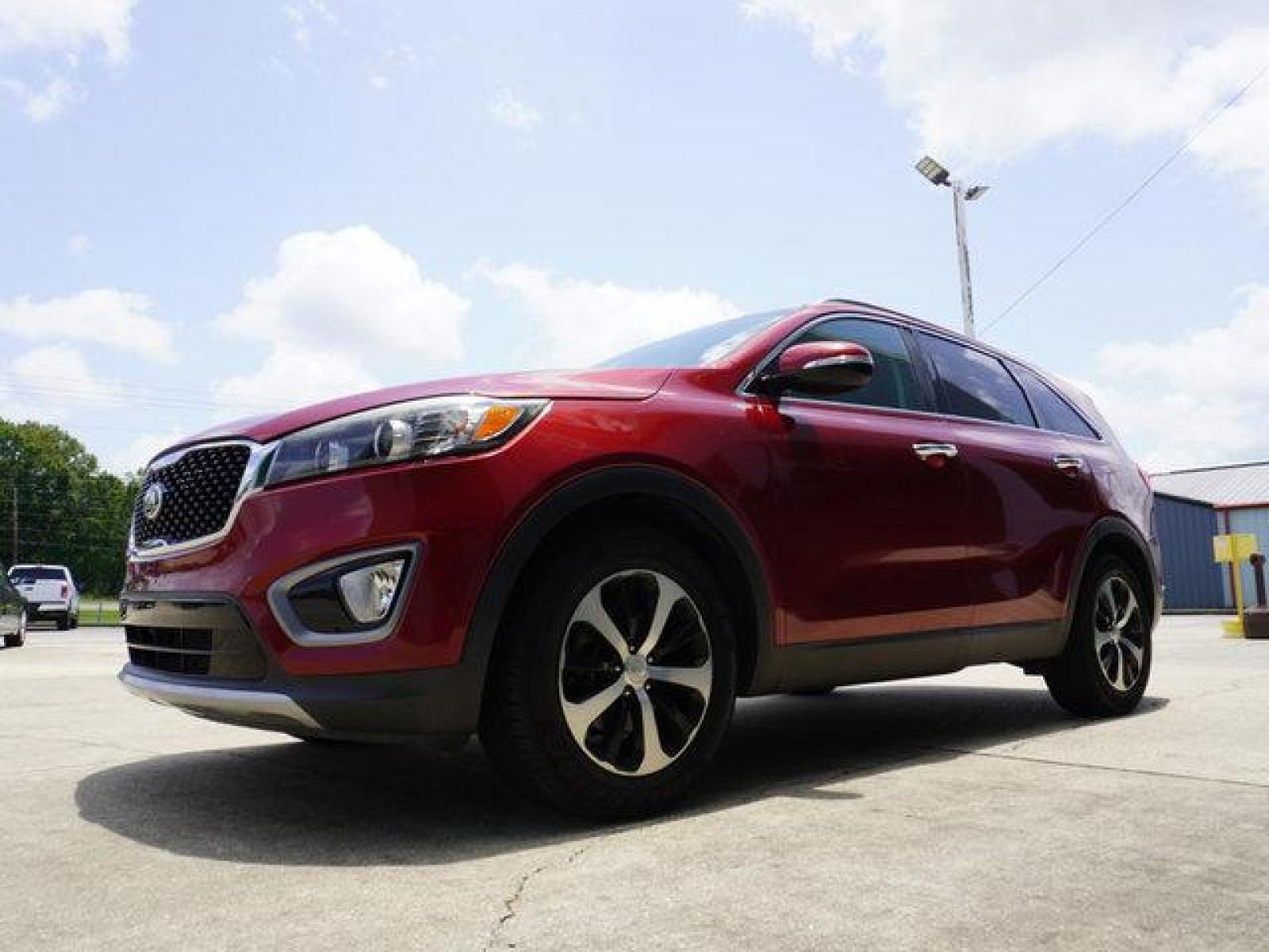 2016 Red Kia Sorento (5XYPH4A10GG) with an 2.0L 4Cyl Turbo engine, Automatic transmission, located at 6904 Johnston St., Lafayette, LA, 70503, (337) 988-1960, 30.143589, -92.100601 - Prices are subject to change as improvements done by the service dept. Prices are for Cash sales only, Plus TTL. This Vehicle is Serviced well and Warranties Available too. Easy Financing. Drives Great and everything works. Price subject to change as improvements done by the service dept. Easy CR - Photo #5