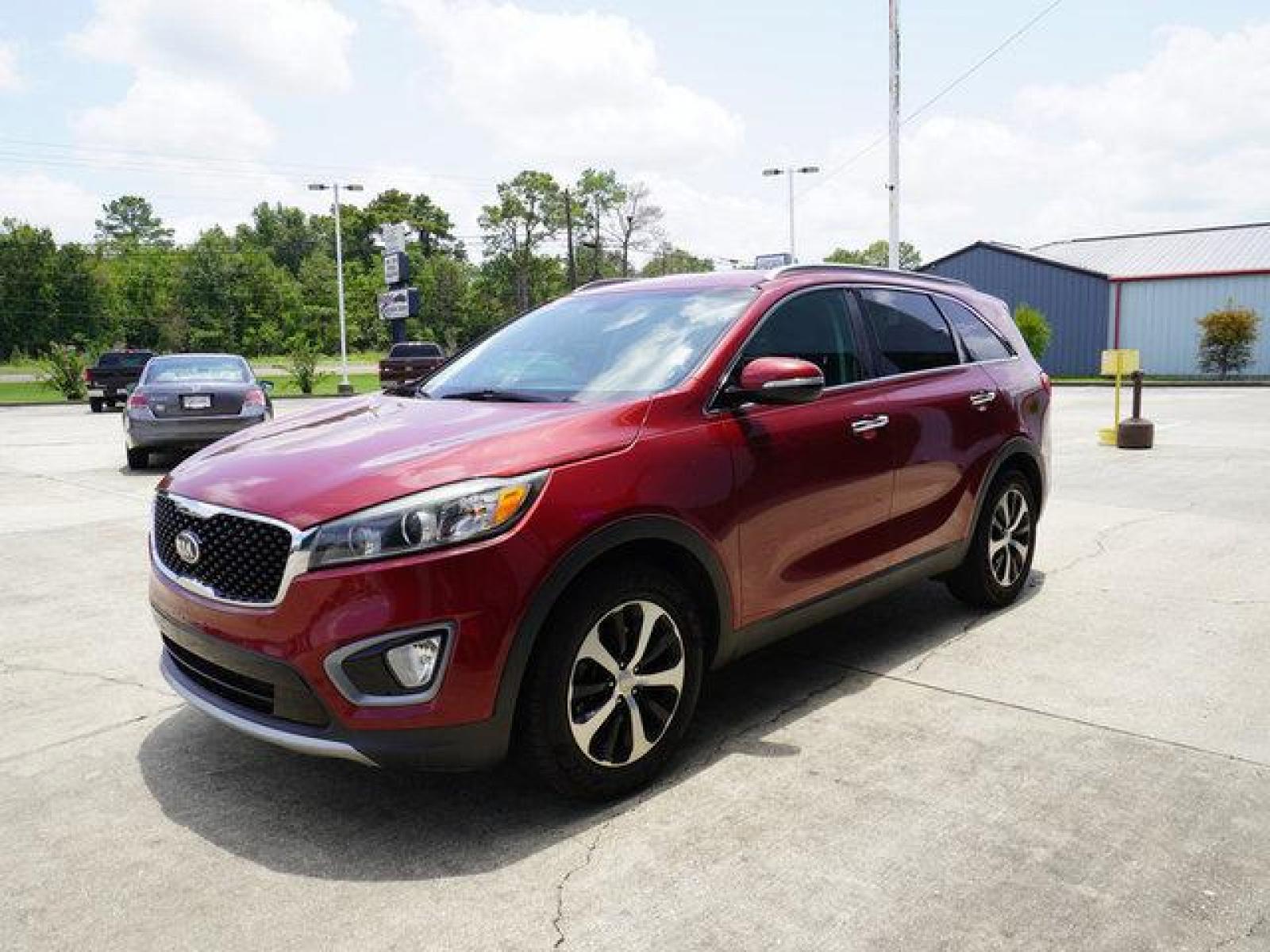 2016 Red Kia Sorento (5XYPH4A10GG) with an 2.0L 4Cyl Turbo engine, Automatic transmission, located at 6904 Johnston St., Lafayette, LA, 70503, (337) 988-1960, 30.143589, -92.100601 - Prices are subject to change as improvements done by the service dept. Prices are for Cash sales only, Plus TTL. This Vehicle is Serviced well and Warranties Available too. Easy Financing. Drives Great and everything works. Price subject to change as improvements done by the service dept. Easy CR - Photo #6