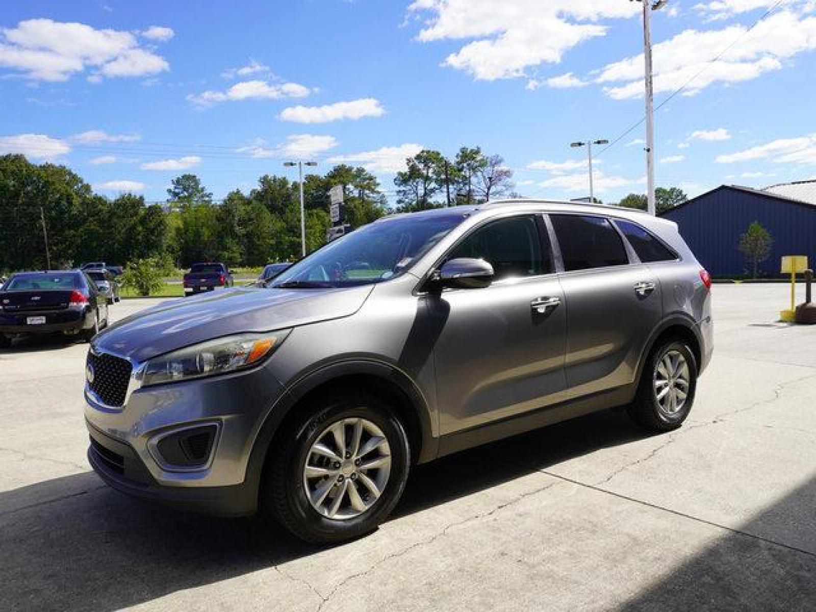 2016 Gray Kia Sorento (5XYPG4A5XGG) with an 3.3L V6 engine, Automatic transmission, located at 6904 Johnston St., Lafayette, LA, 70503, (337) 988-1960, 30.143589, -92.100601 - Prices are subject to change as improvements done by the service dept. Prices are for Cash sales only, Plus TTL. This Vehicle is Serviced well and Warranties Available too. Easy Financing. Drives Great and everything works. Price subject to change as improvements done by the service dept. Easy CR - Photo #6