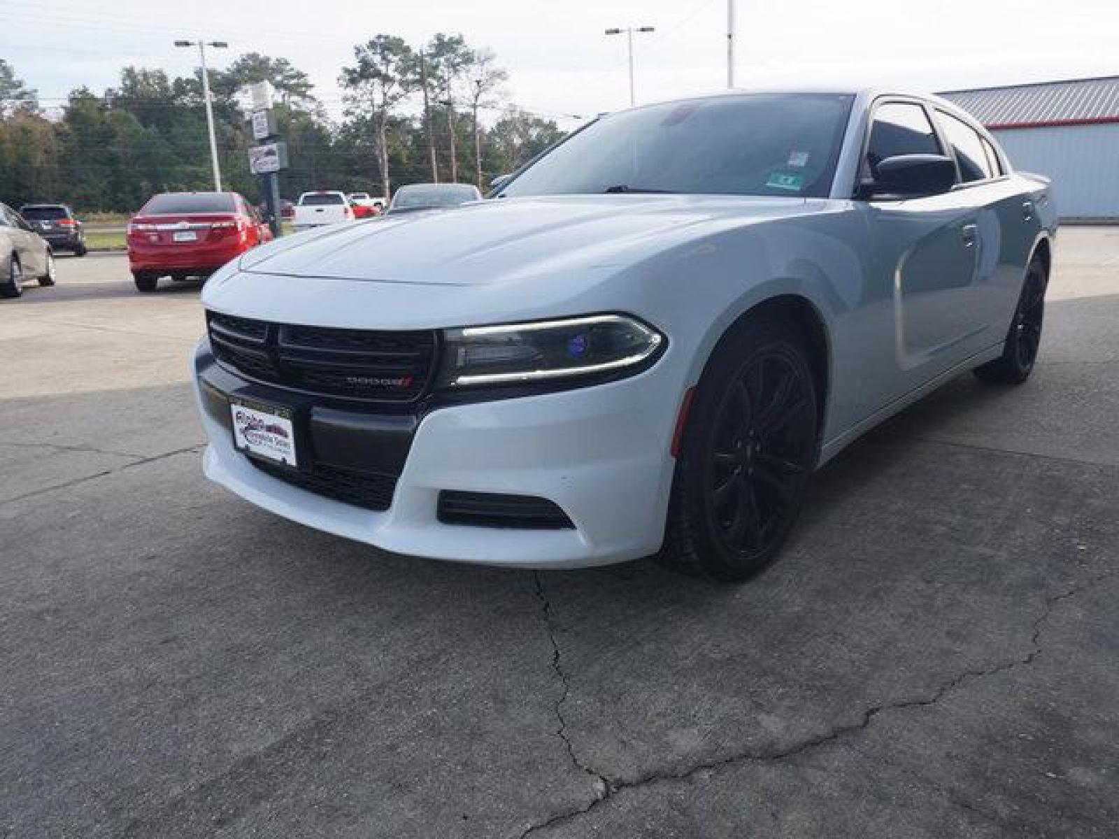 2018 White Dodge Charger (2C3CDXBG4JH) with an 3.6L V6 engine, Automatic transmission, located at 6904 Johnston St., Lafayette, LA, 70503, (337) 988-1960, 30.143589, -92.100601 - Prices are subject to change as improvements done by the service dept. Prices are for Cash sales only, Plus TTL. This Vehicle is Serviced well and Warranties Available too. Easy Financing. Drives Great and everything works. Price subject to change as improvements done by the service dept. Easy CR - Photo #5