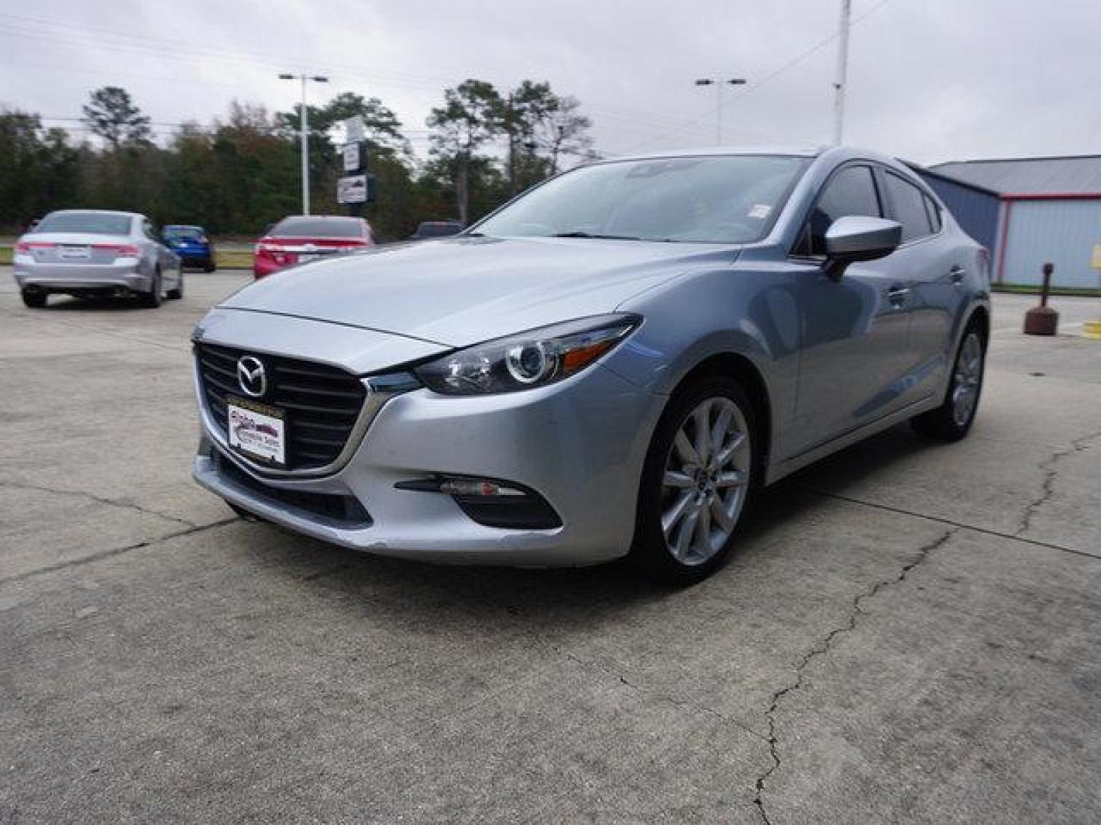 2017 Silver Mazda Mazda3 (3MZBN1V75HM) with an 2.0L 4Cyl engine, Automatic transmission, located at 6904 Johnston St., Lafayette, LA, 70503, (337) 988-1960, 30.143589, -92.100601 - Prices are subject to change as improvements done by the service dept. Prices are for Cash sales only, Plus TTL. This Vehicle is Serviced well and Warranties Available too. Easy Financing. Drives Great and everything works. Price subject to change as improvements done by the service dept. Easy CR - Photo #5